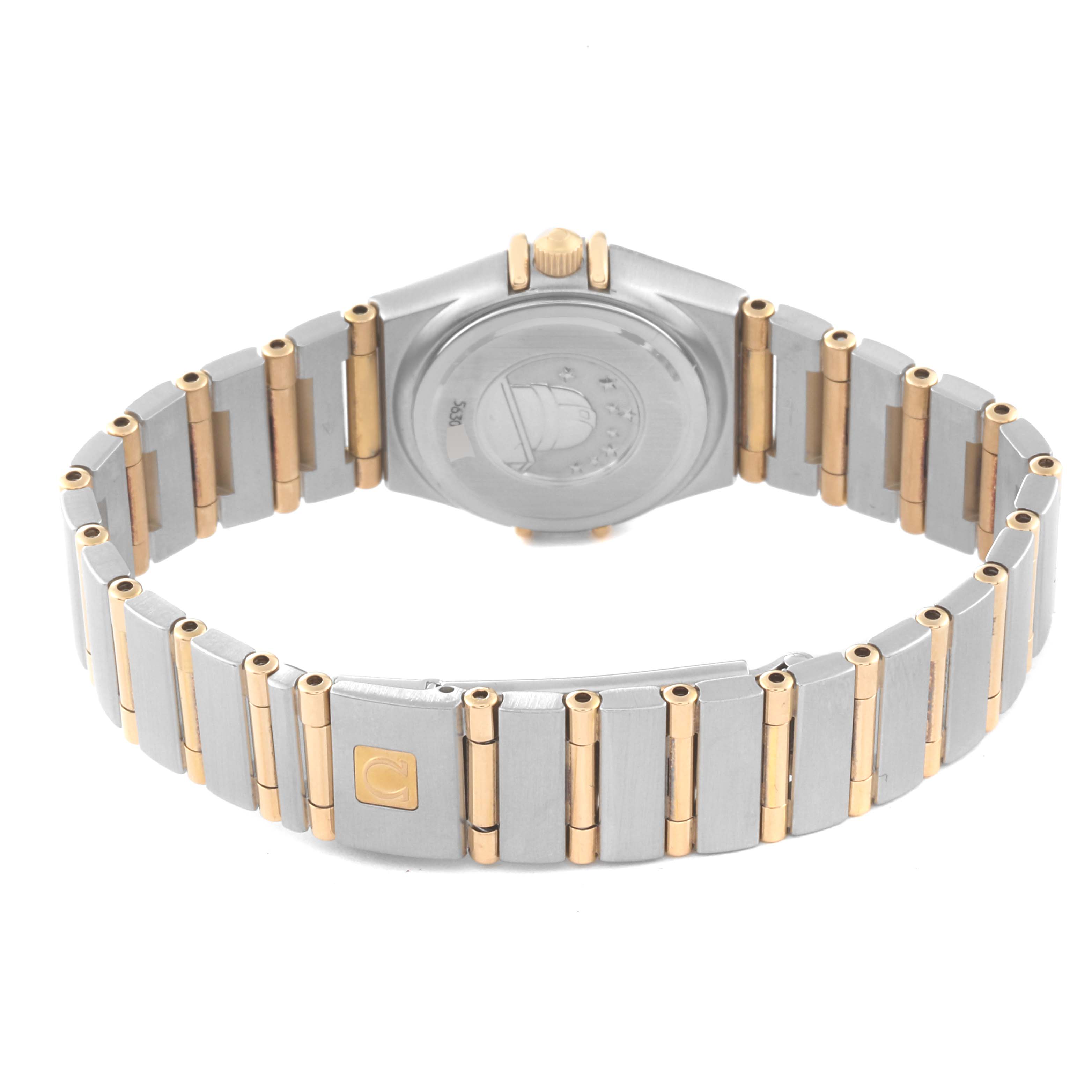 This Omega 1267.75.00 Women's Steel and Gold (two tone) Mother of Pearl Dial 1267.75.00 Women's Steel and Gold (two tone) Mother of Pearl Dial Constellation 95 Mother Of Pearl Diamond Yellow Gold Steel Ladies Watch 1267.75.00 is shown from the back, displaying its bracelet and case back.