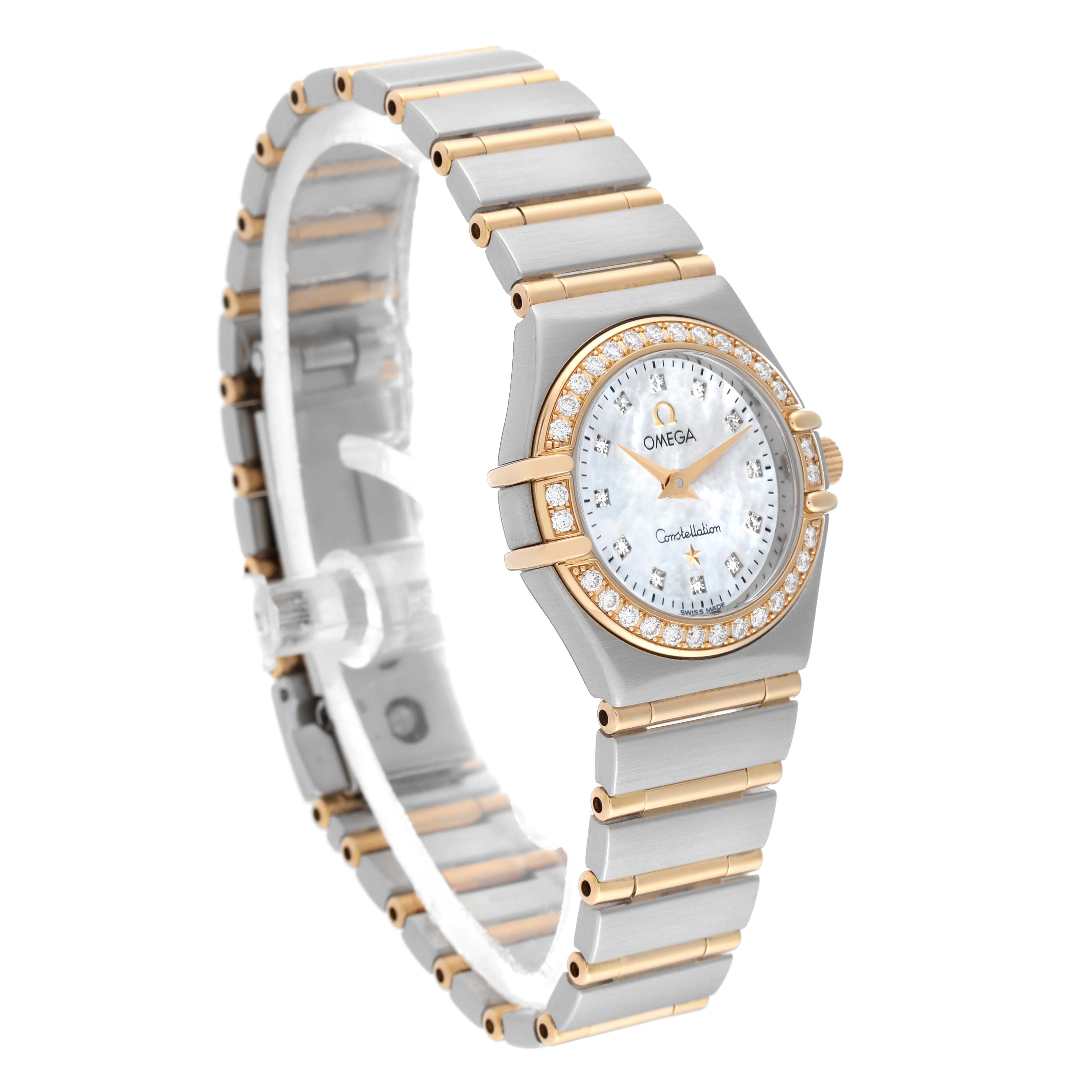 The Omega 1267.75.00 Women's Steel and Gold (two tone) Mother of Pearl Dial 1267.75.00 Women's Steel and Gold (two tone) Mother of Pearl Dial Constellation 95 1267.75.00 watch is shown from an oblique angle, highlighting its face, bezel, and bracelet.
