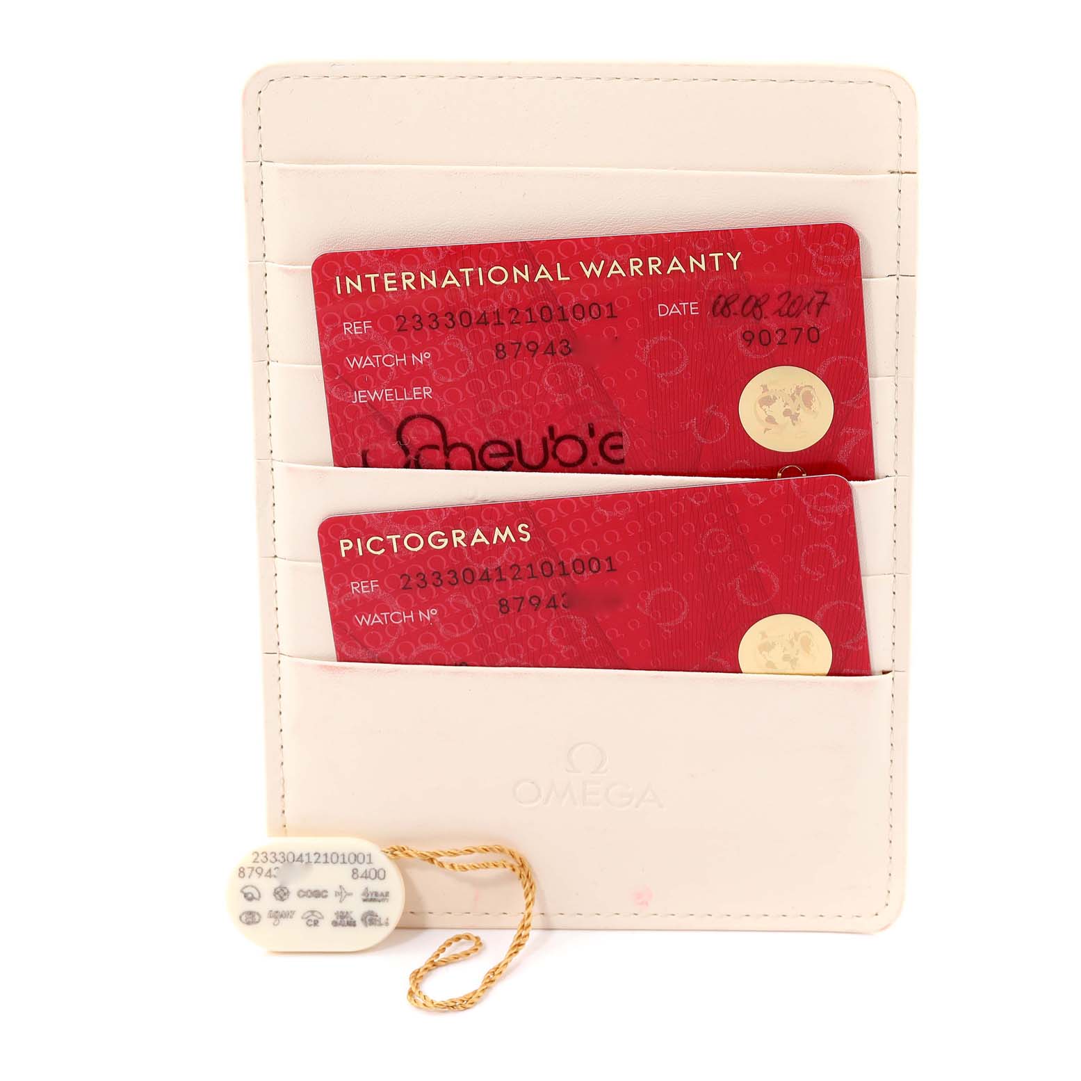 The image shows an Omega Seamaster 233.30.41.21.01.001 Men's Stainless Steel Black Dial 233.30.41.21.01.001 Men's Stainless Steel Black Dial's warranty and pictograms cards in a holder, along with a model tag on a string.