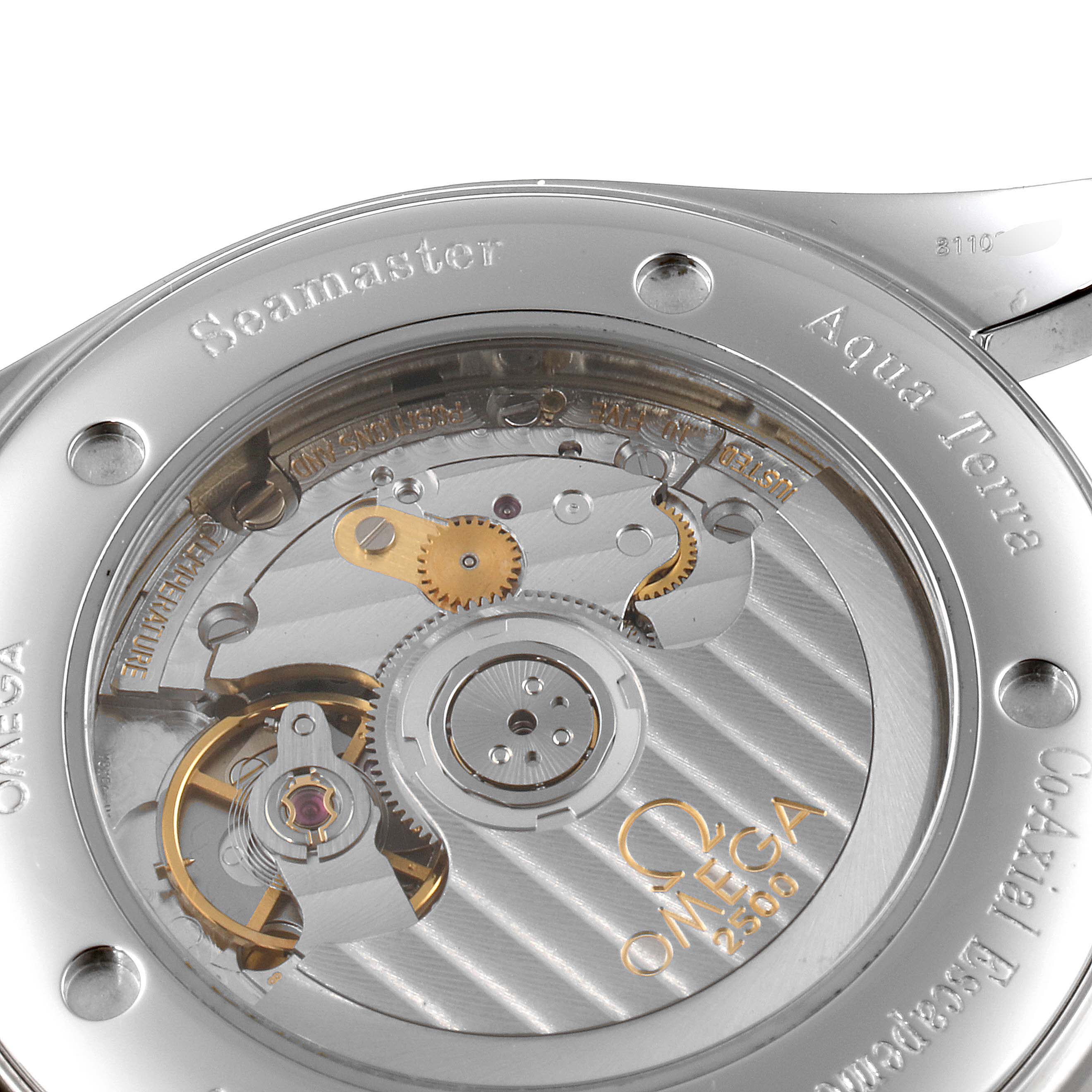 The image shows the Omega Aqua Terra 2503.80.00 Men
s Stainless Steel Blue Dial 2503.80.00 Men
s Stainless Steel Blue Dial watch
s case back, highlighting the internal mechanical movement components.