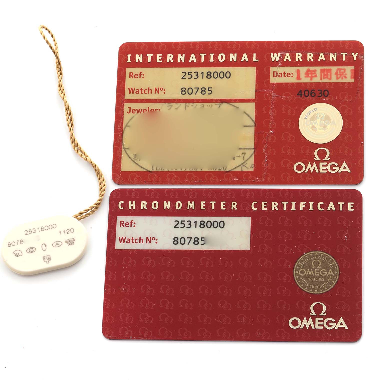 The image shows the international warranty and chronometer certificate cards, along with a tag, for the Omega Seamaster 2531.80.00 Men's Stainless Steel Blue Dial 2531.80.00 Men's Stainless Steel Blue Dial.