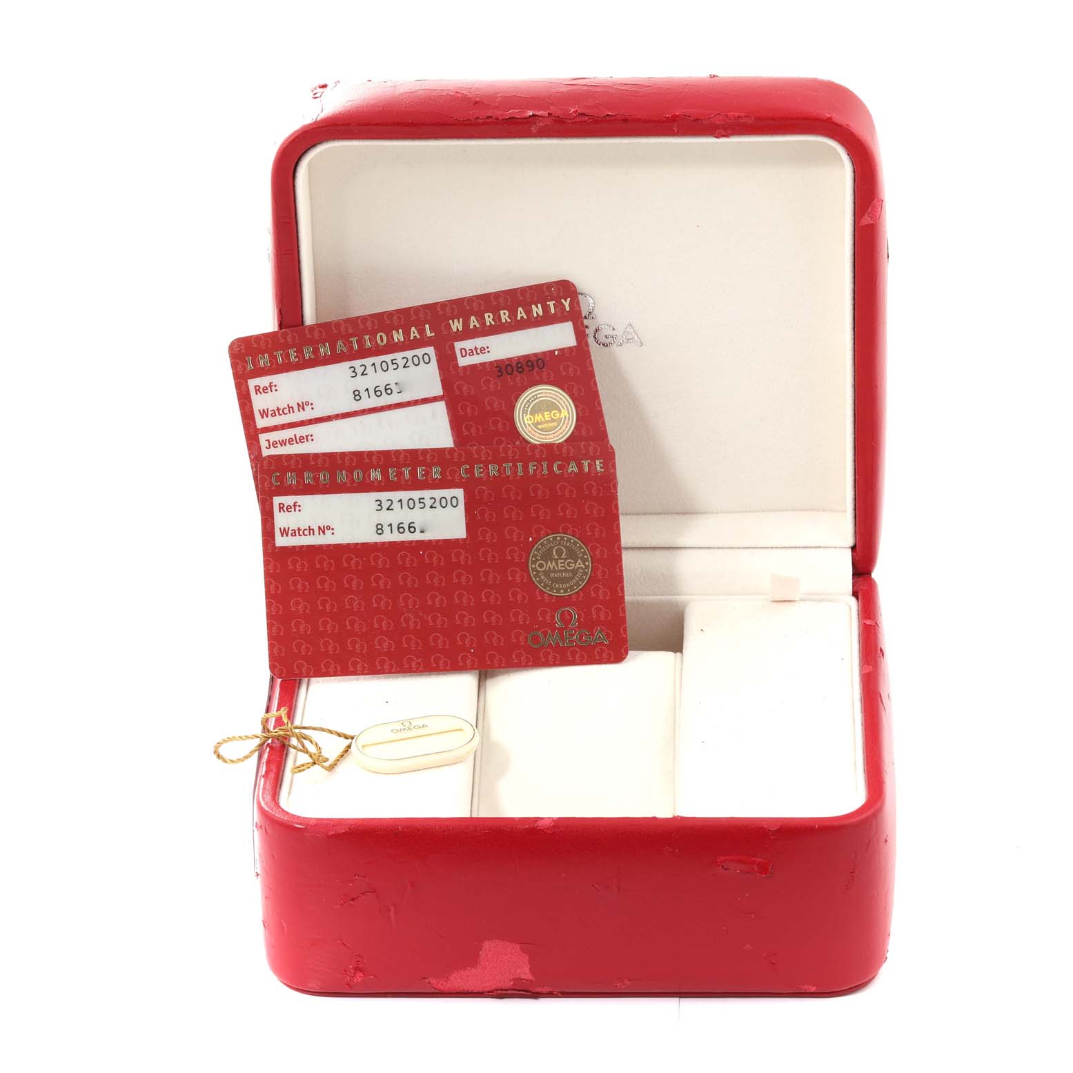 The image shows a red Omega Speedmaster 3210.52.00 Men
s Stainless Steel Black Dial 3210.52.00 Men
s Stainless Steel Black Dial watch box, an international warranty card, and a chronometer certificate.