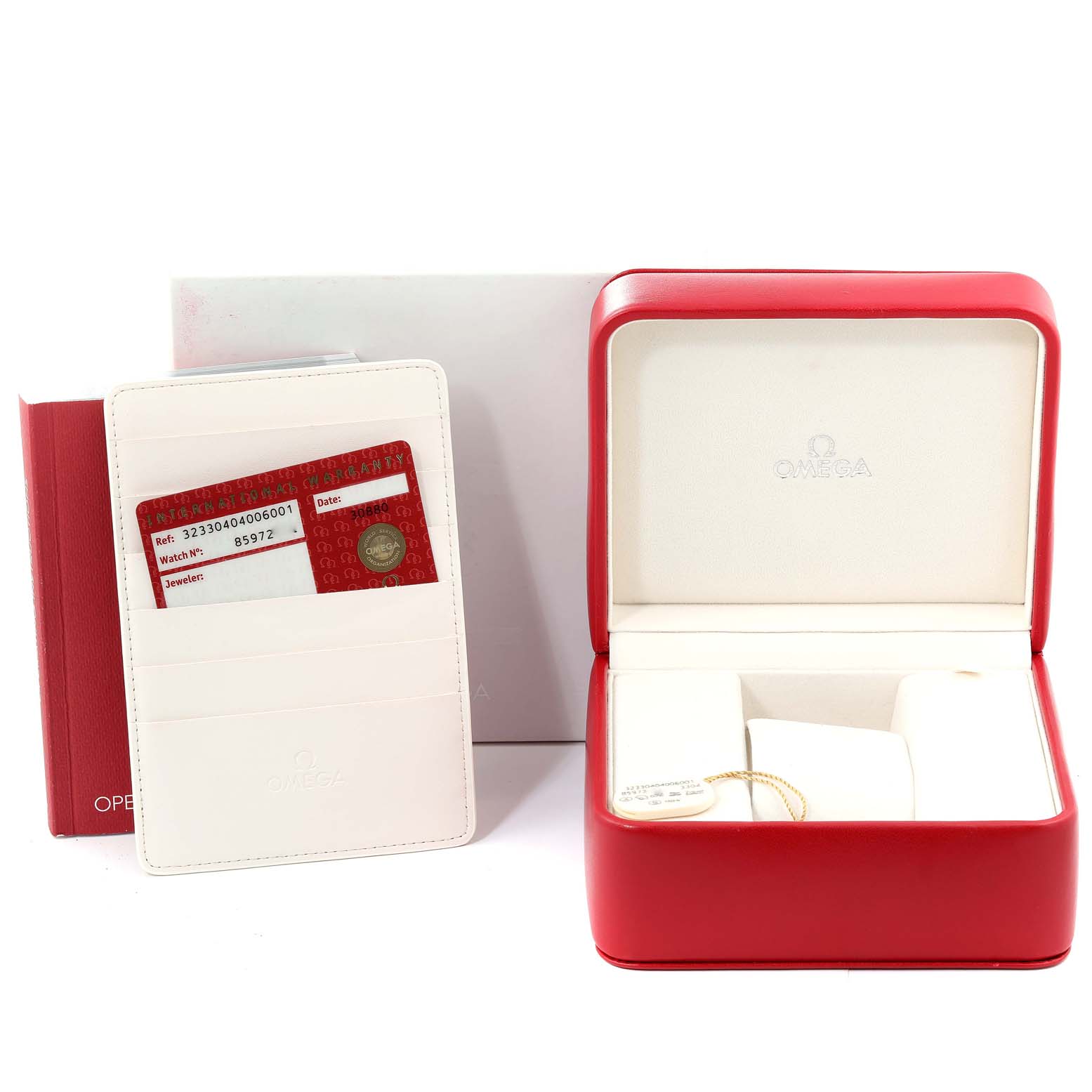 This image shows the empty packaging and warranty card for the Omega Speedmaster 323.30.40.40.06.001 Men's Stainless Steel Grey Dial 323.30.40.40.06.001 Men's Stainless Steel Grey Dial model, including the watch box and documents.