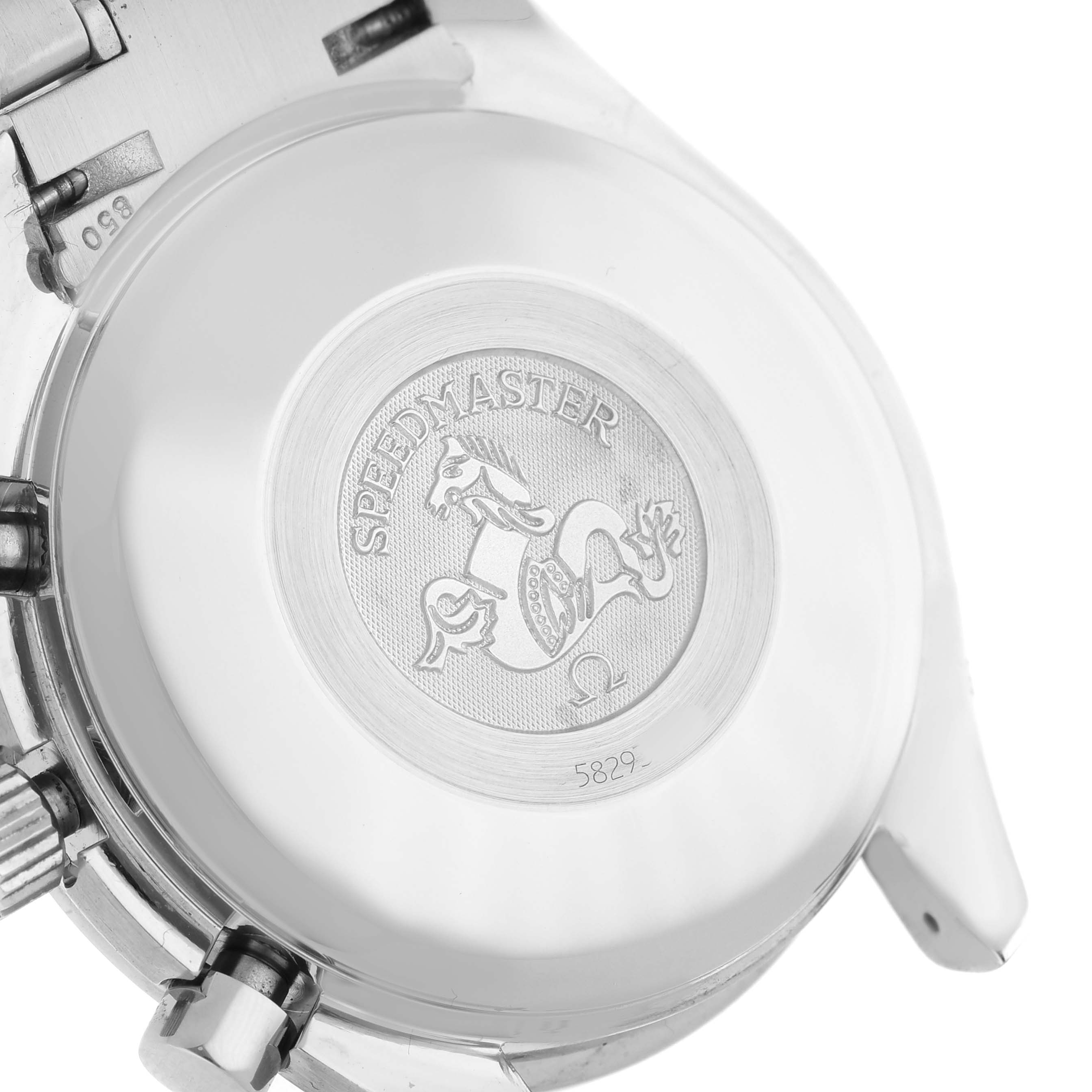 The image shows the case back of an Omega Speedmaster 3523.30.00 Men's Stainless Steel Silver Dial watch, highlighting the engraved logo.