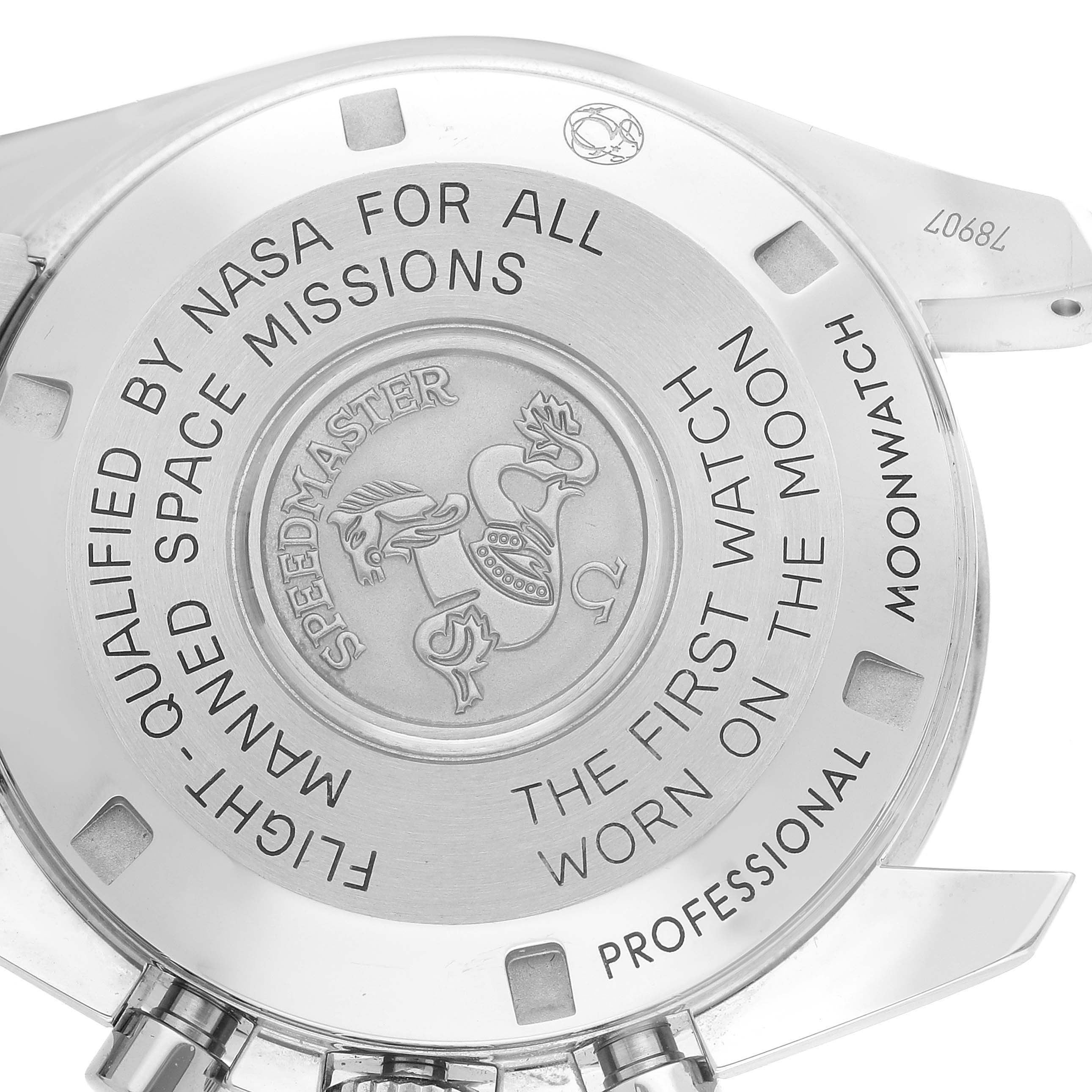 The image shows the back case of an Omega Speedmaster 311.30.42.30.01.005 Men
s Stainless Steel Black Dial 311.30.42.30.01.005 Men
s Stainless Steel Black Dial watch, highlighting inscriptions and engravings.