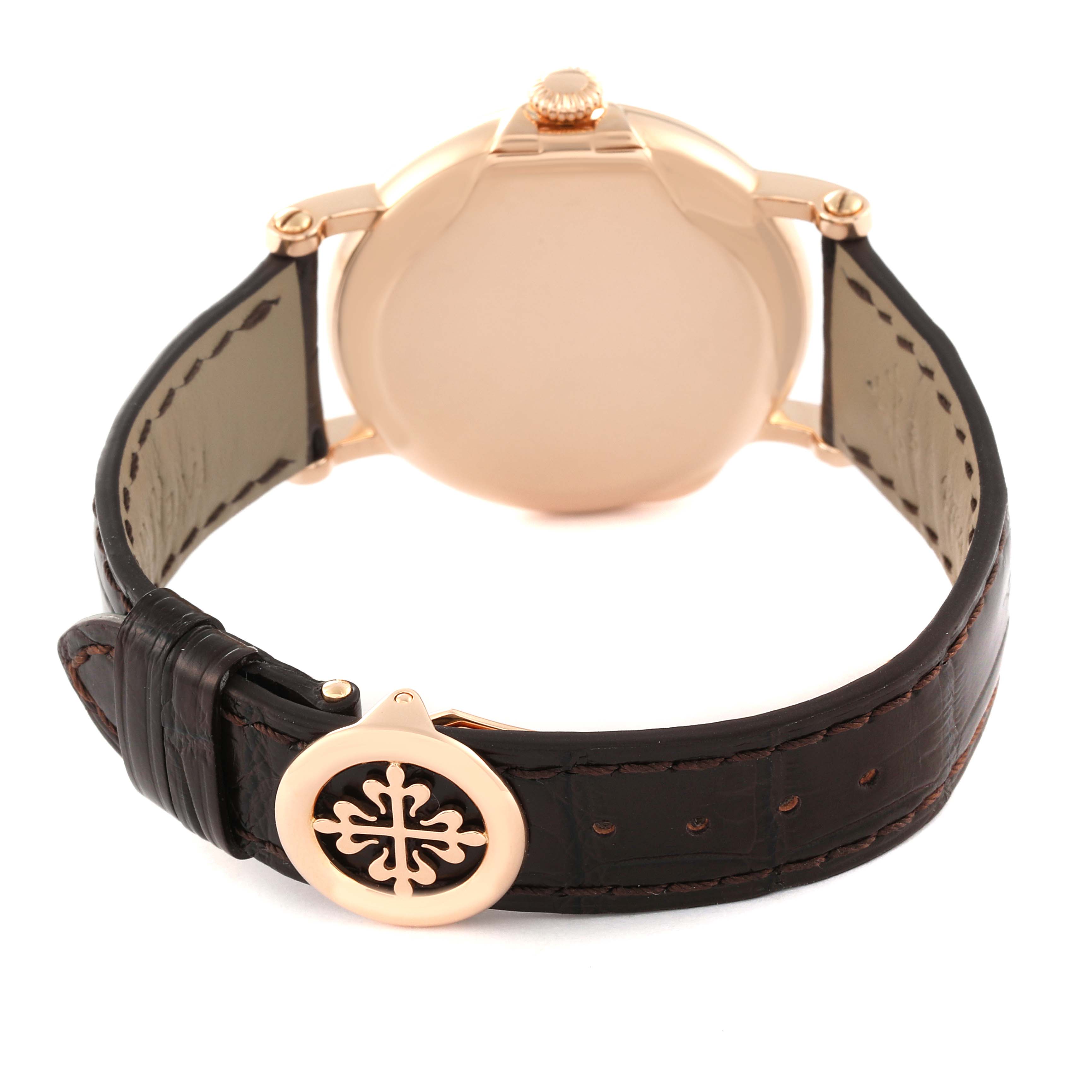 The image shows the back view of a Patek Philippe Calatrava 5153R-001 Men's Rose Gold Silver Dial 5153R-001 Men's Rose Gold Silver Dial watch, highlighting its case back and leather strap with the clasp.
