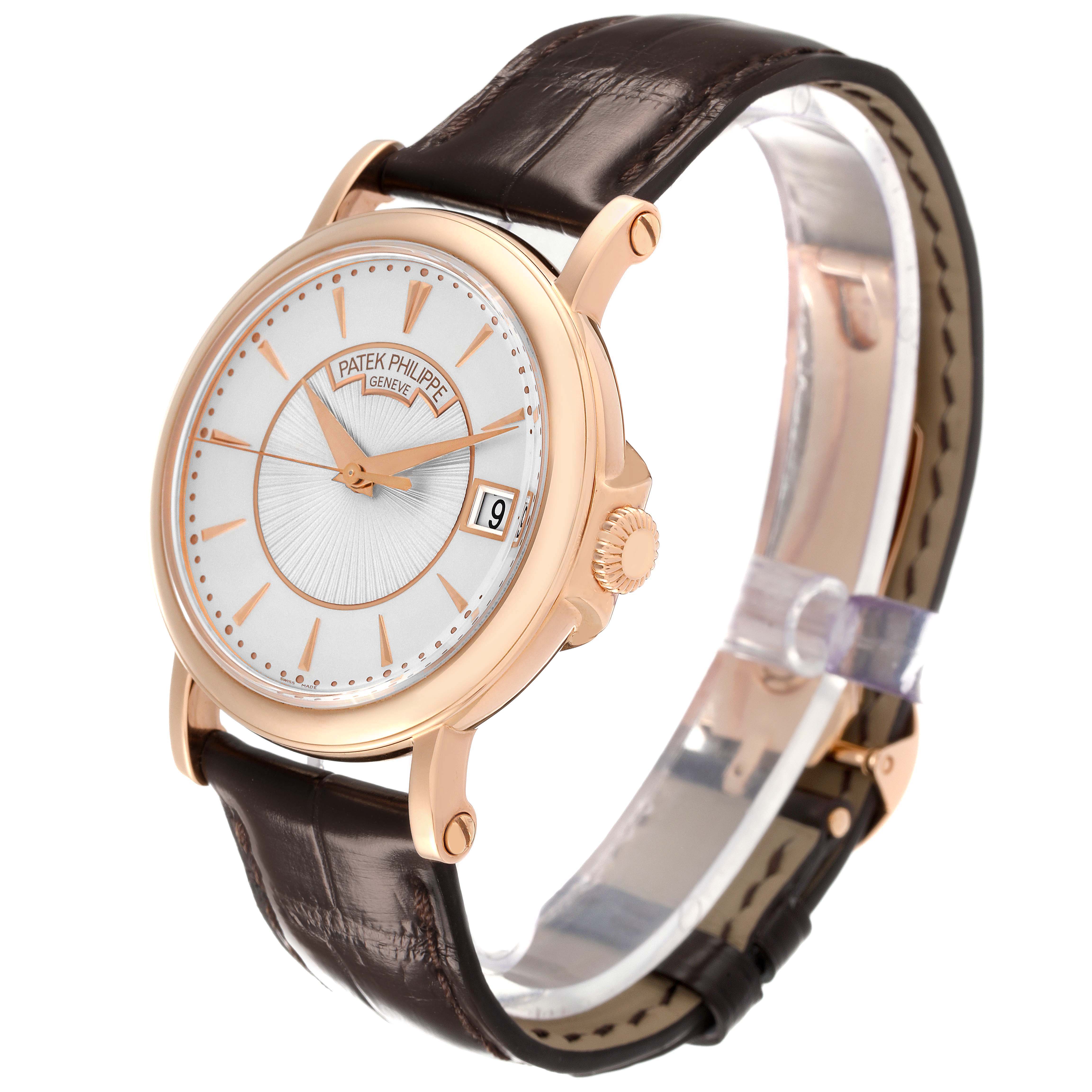 The Patek Philippe Calatrava 5153R-001 Men's Rose Gold Silver Dial watch is shown at a slight angle, highlighting the face, bezel, and leather strap.