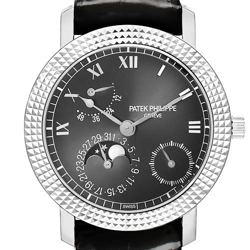 The Patek Philippe Calatrava 5057G-010 Men's White Gold Grey Dial watch is shown from the front, displaying its textured bezel, dial with Roman numerals, and subdials.