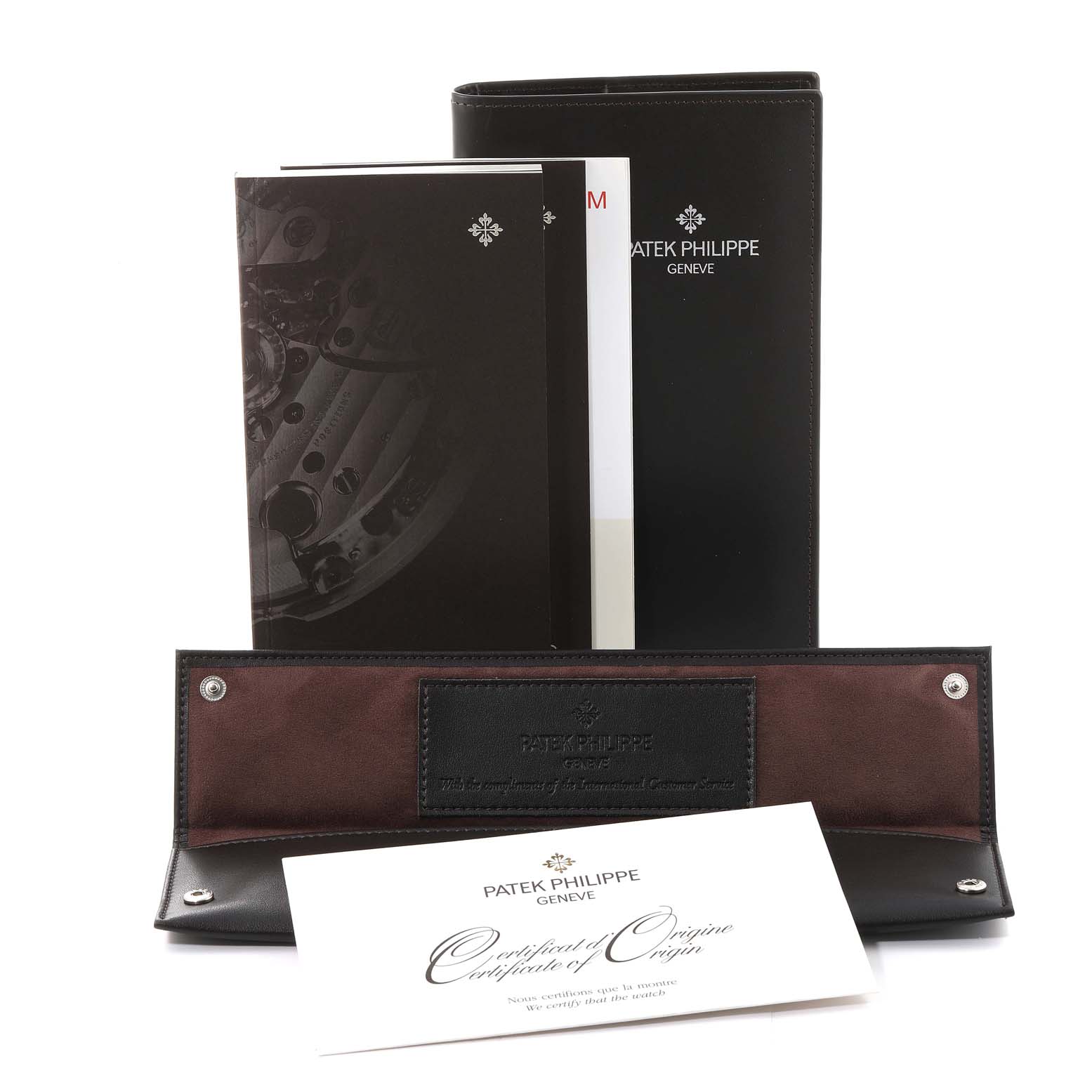 The image shows Patek Philippe Calatrava 5227G-001 Men's White Gold Beige Dial 5227G-001 Men's White Gold Beige Dial model accessories, including a pouch, manuals, and a certificate, from a front angle.