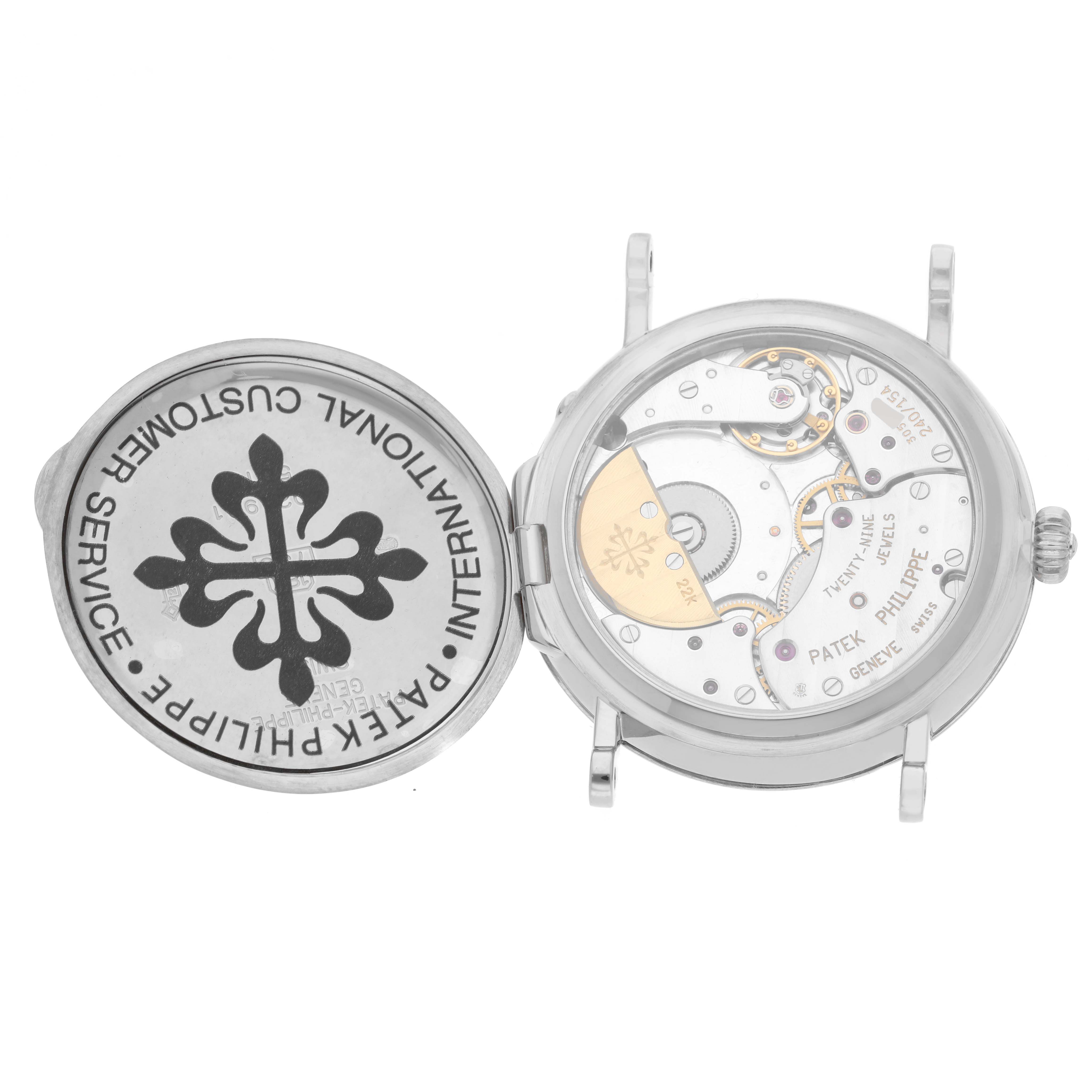 This image shows the back of a Patek Philippe Complications 5015G-001 Men's White Gold White Dial 5015G-001 Men's White Gold White Dial watch with the case back open, exposing the movement and internal components.