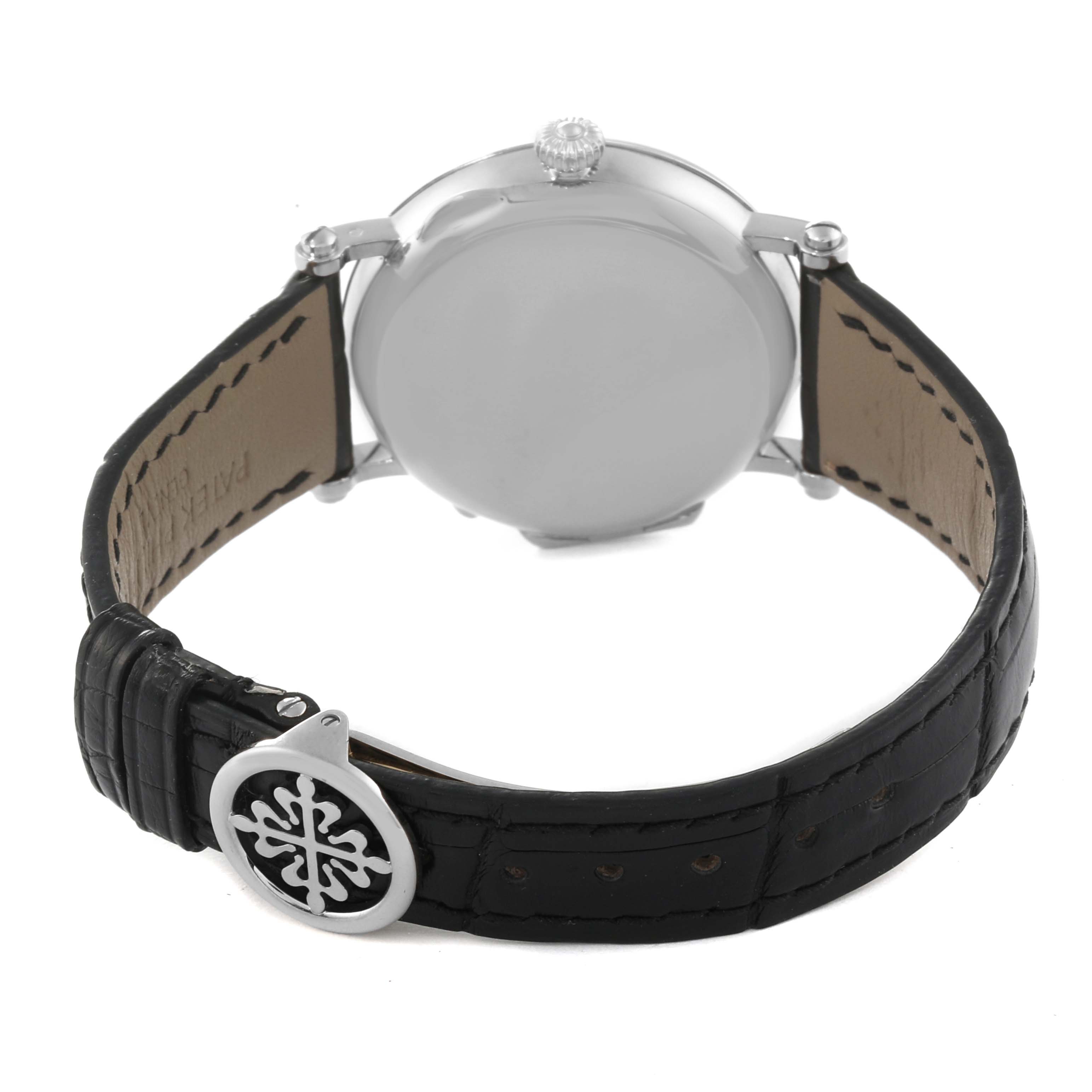 The image shows the back view of the Patek Philippe Complications 5015G-001 Men's White Gold White Dial 5015G-001 Men's White Gold White Dial watch with its leather strap and buckle.