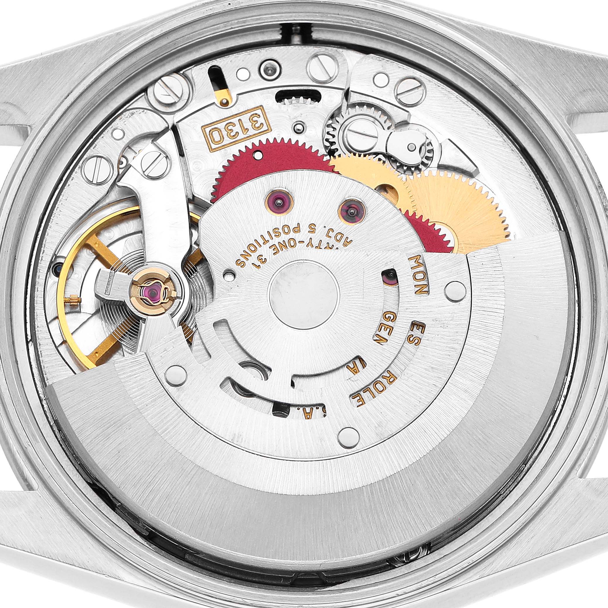 The image shows the inner movement mechanism of a Rolex Air-King 14000 Men's Stainless Steel Blue Dial watch from a rear angle, highlighting gears and components.