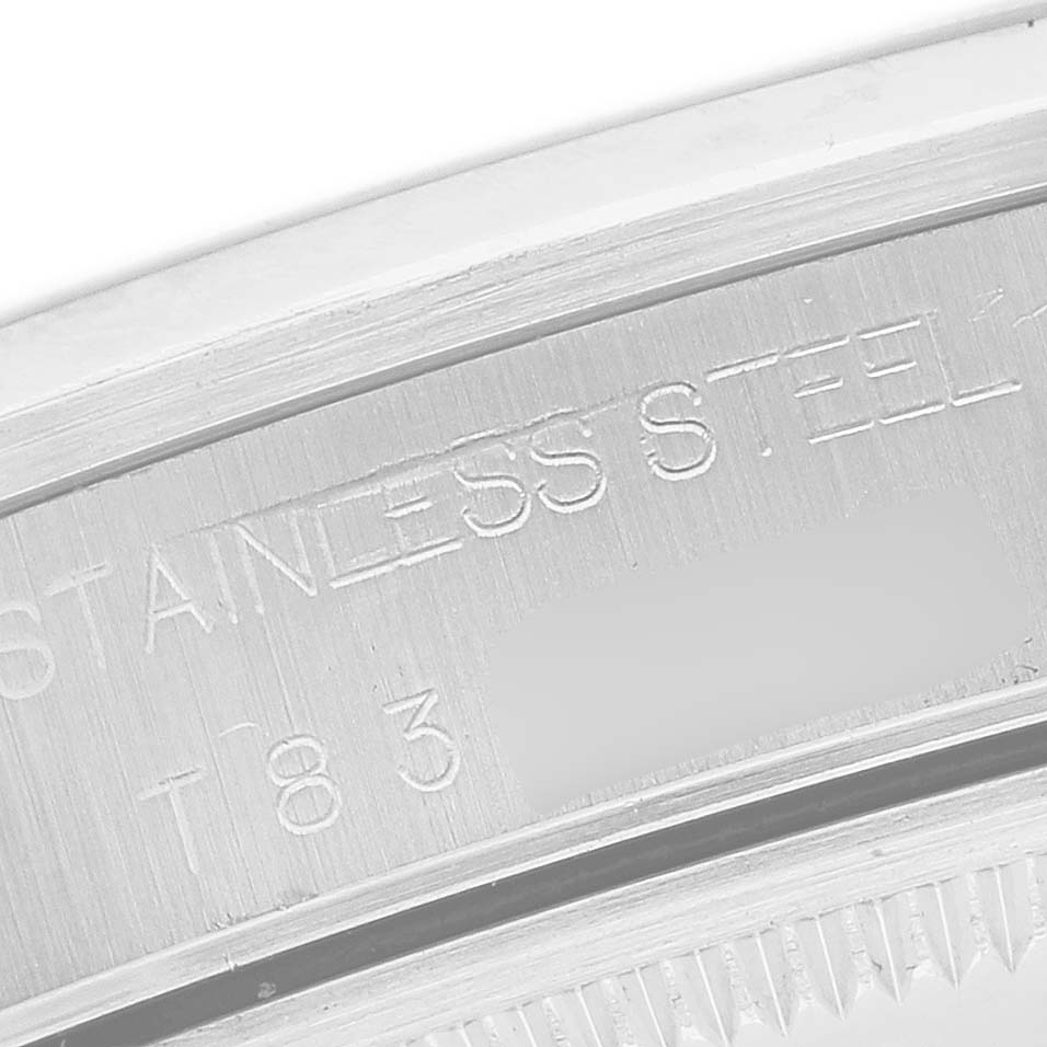 The image shows a close-up view of the case back edge of the Rolex Air-King 14000 Men's Stainless Steel Blue Dial, featuring engraved text.