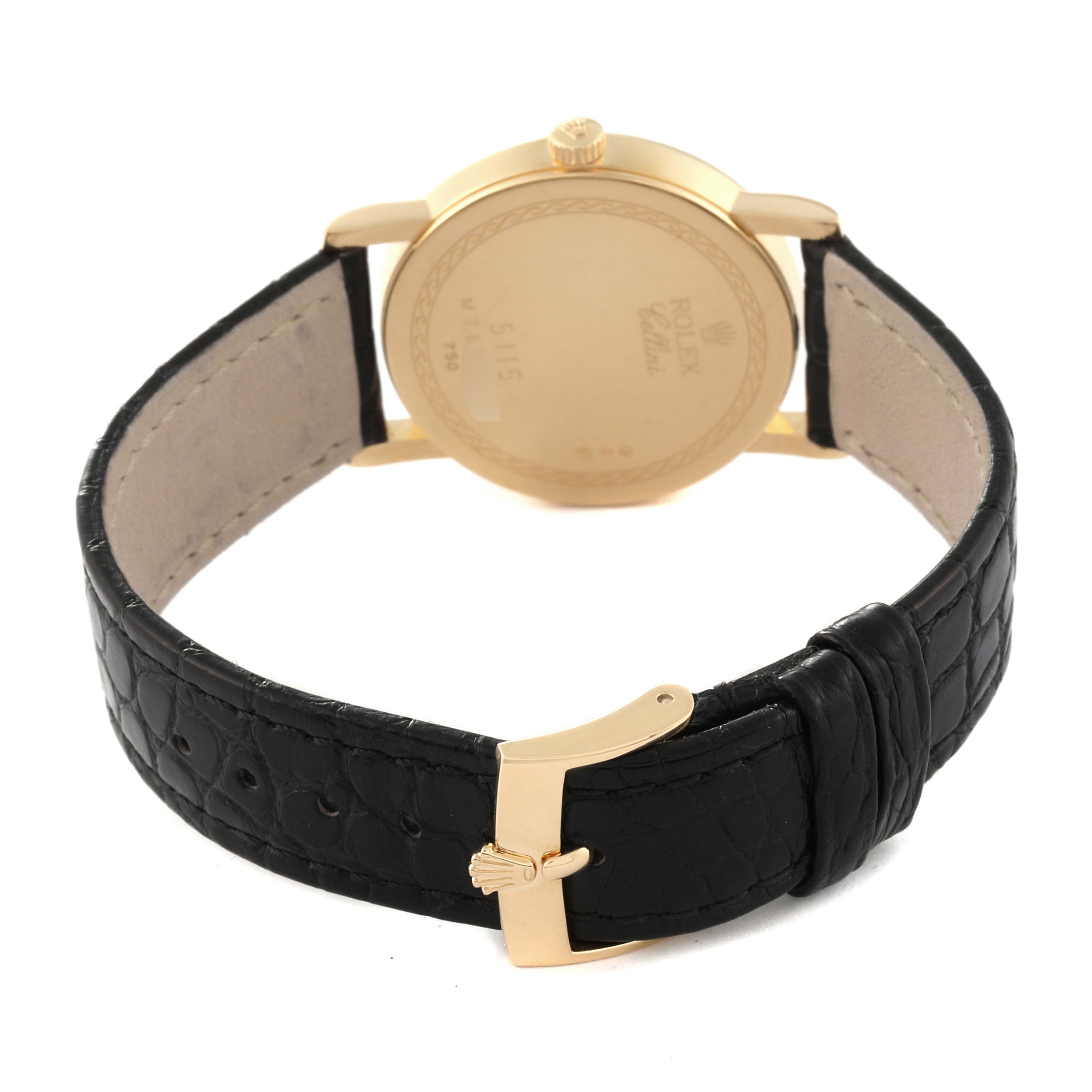 The image shows the back view of a Rolex Cellini 5115/8 Men's Yellow Gold Beige Dial 5115/8 Men's Yellow Gold Beige Dial watch, highlighting its leather strap and gold buckle.