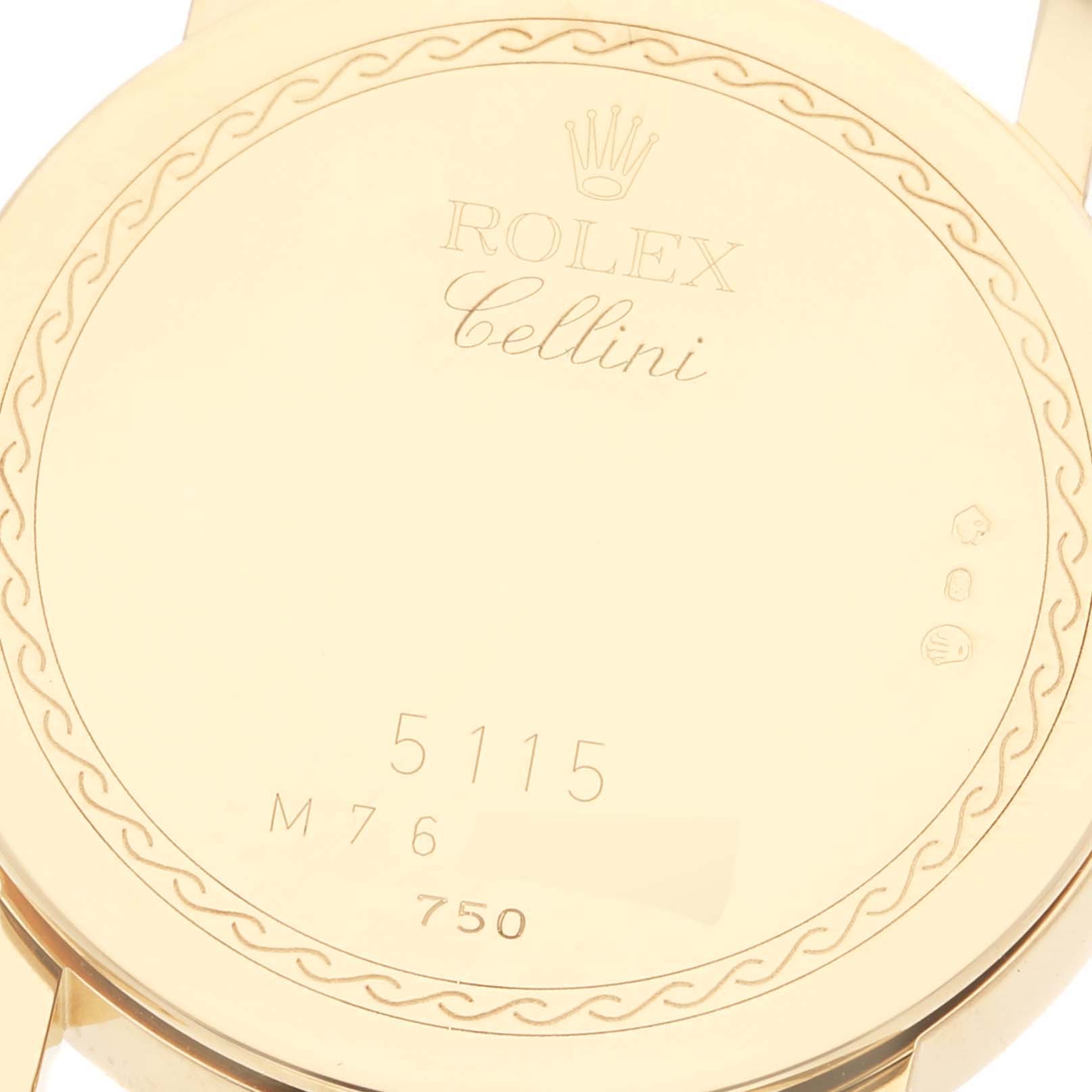 This is a close-up view of the back of a Rolex Cellini 5115/8 Men's Yellow Gold Beige Dial 5115/8 Men's Yellow Gold Beige Dial model watch, showcasing its engravings and hallmark.
