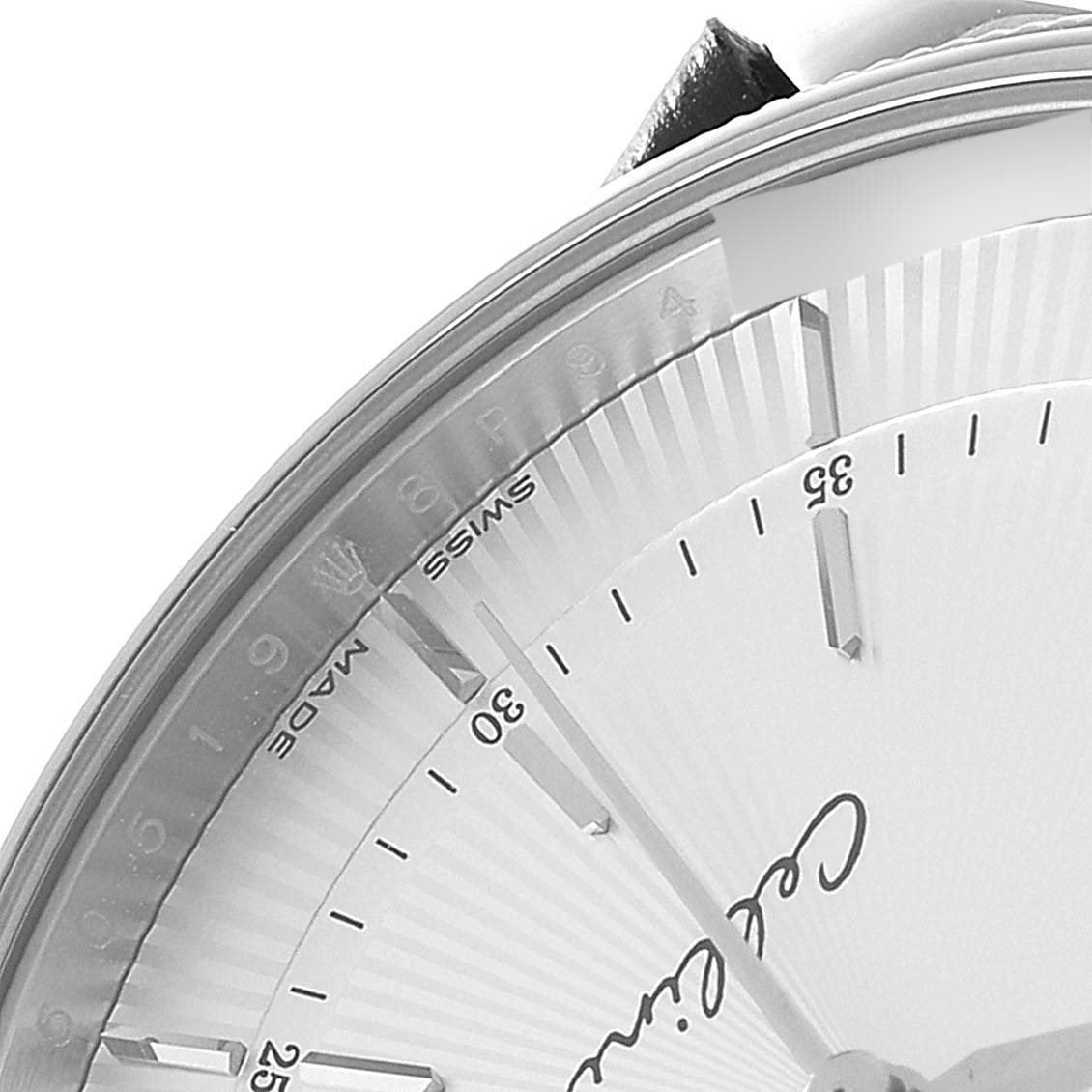 The image shows the upper-left portion of the dial and case of a Rolex Cellini 50519 Men's White Gold Silver Dial 50519 Men's White Gold Silver Dial watch, focusing on the minute markers and part of the strap.