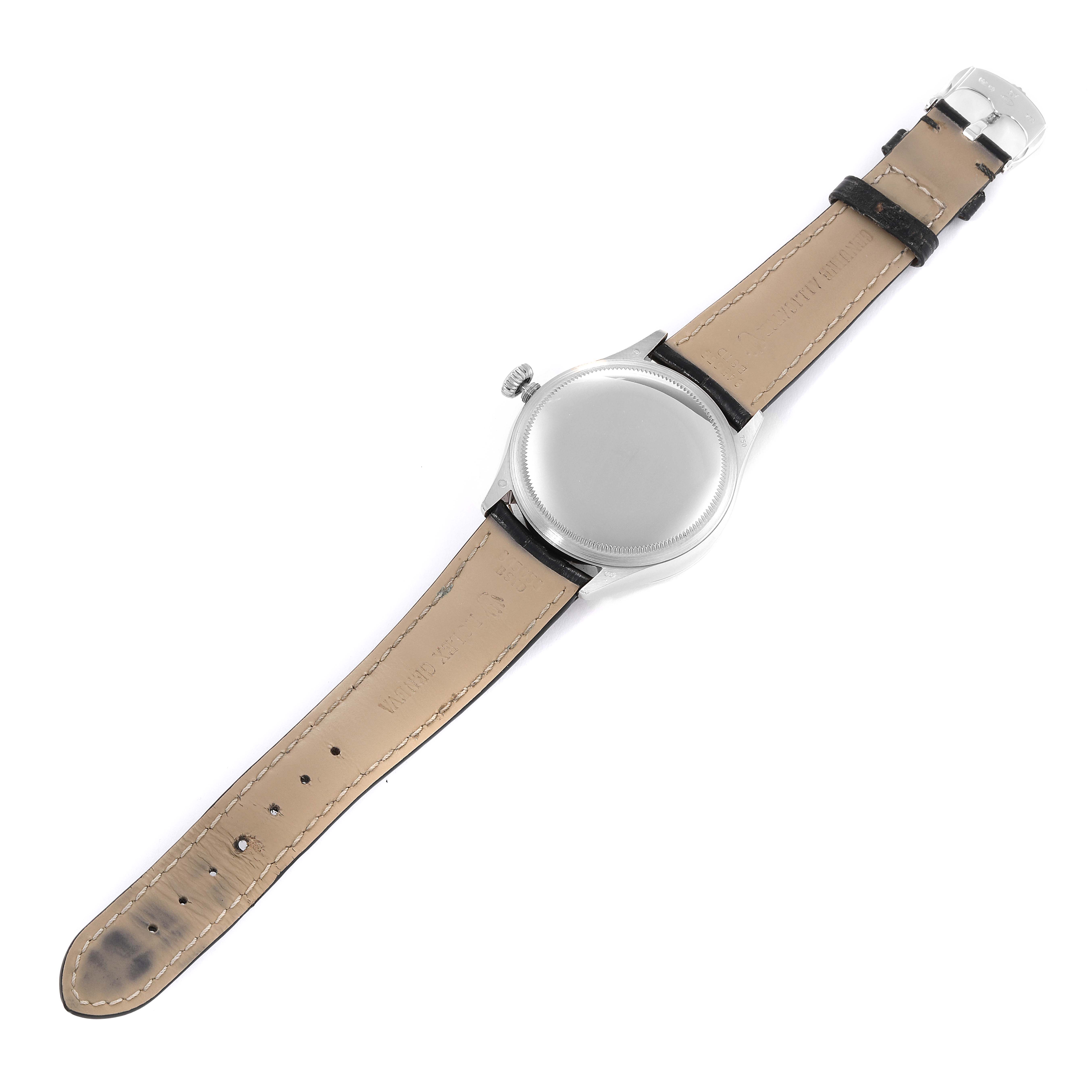 This image shows the back view of a Rolex Cellini 50519 Men's White Gold Silver Dial 50519 Men's White Gold Silver Dial watch, including the case back, crown, and leather strap.