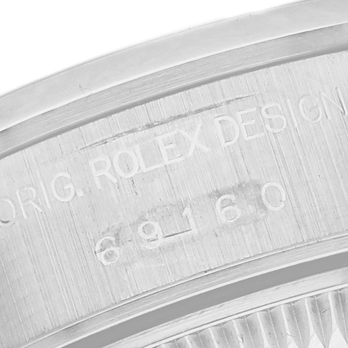 The image shows a Rolex Date 69160 Women's Stainless Steel White Dial 69160 Women's Stainless Steel White Dial model's case side, featuring engravings of the design and model number "69160."