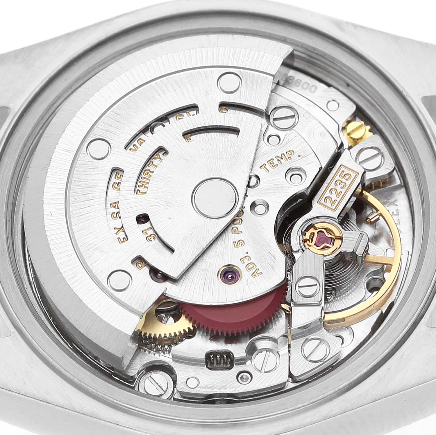 This image shows a close-up of the Rolex Datejust 79173 Women's Steel and Gold (two tone) Champagne Dial movement, highlighting gears and the rotor.