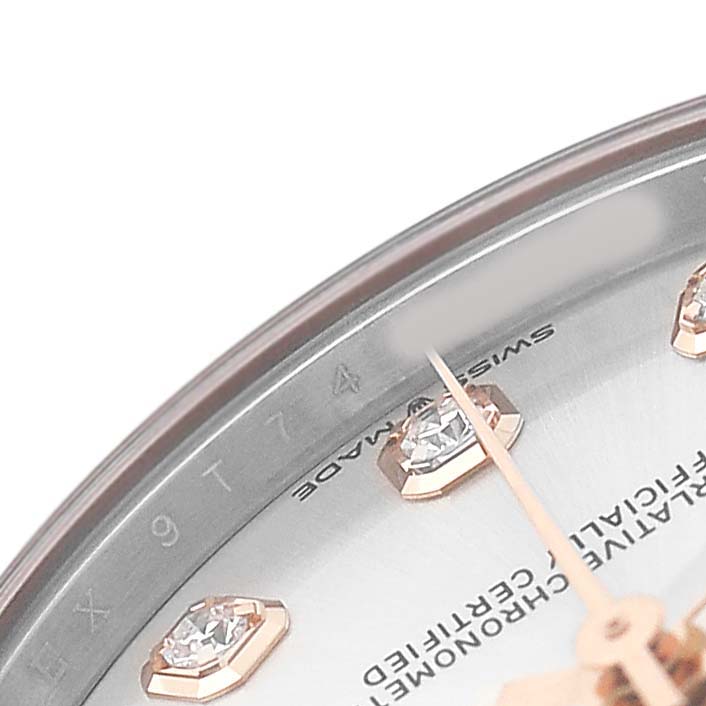 The image shows a close-up of the Rolex Datejust 278241 Women's Steel and Gold (two tone) Silver Dial watch dial, highlighting the diamond hour markers and the hand.