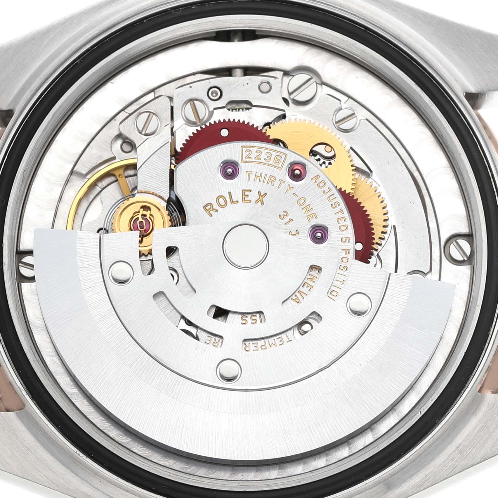 The image shows the back view of a Rolex Datejust 278241 Women's Steel and Gold (two tone) Silver Dial watch, highlighting its intricate movement and rotor.