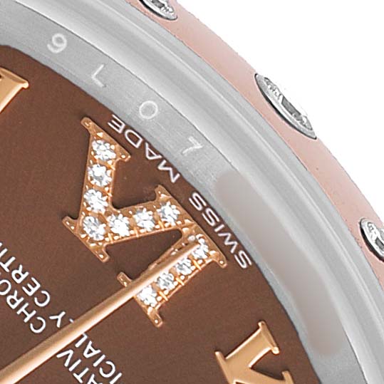 The image shows a close-up of the dial and part of the bezel on a Rolex Datejust 178341 Women's Steel and Gold (two tone) Brown Dial watch, focusing on the "VI" marker with diamond detailing.