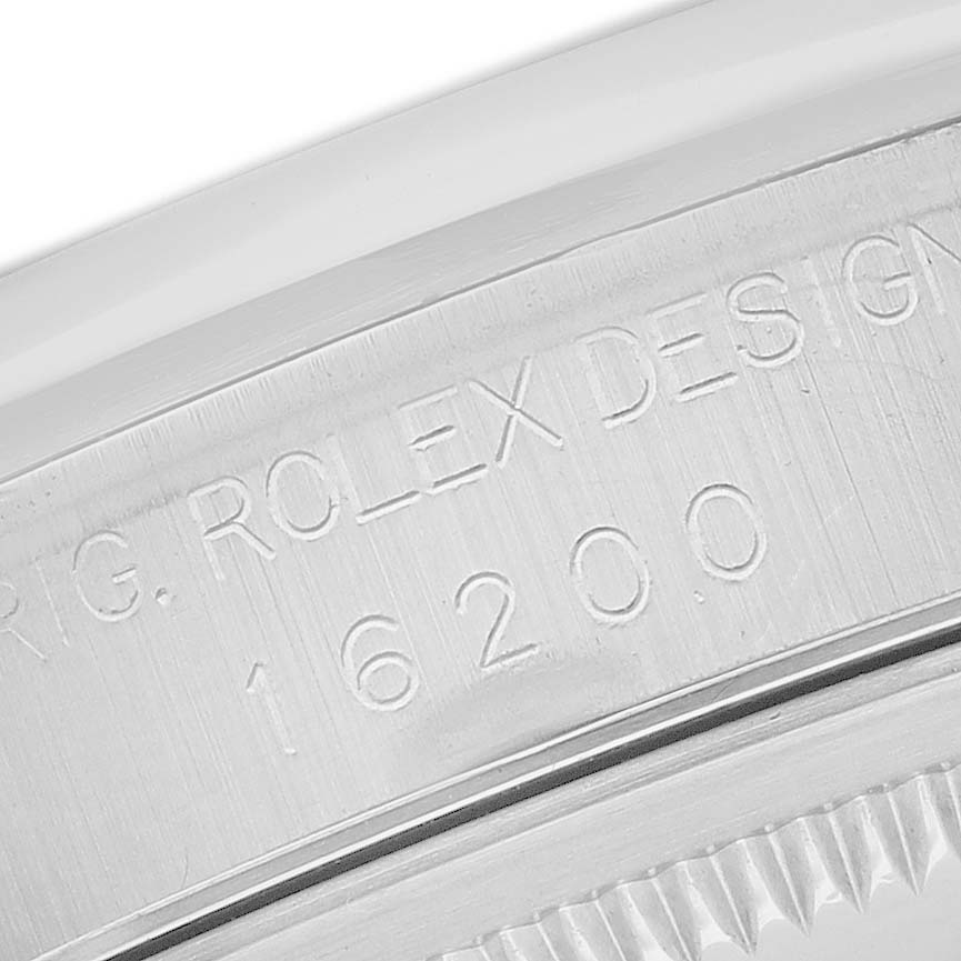 The image shows a close-up of the case side with engraved details of the Rolex Datejust 16200 Men's Stainless Steel Silver Dial model.