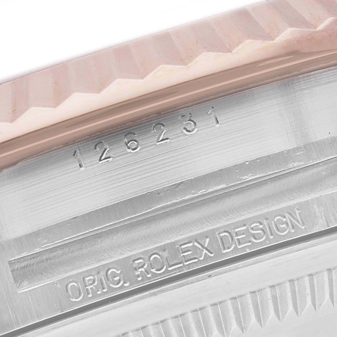 The image shows a close-up of the case side edge of the Rolex Datejust 126231 Men's Steel and Gold (two tone) Grey Dial 126231 Men's Steel and Gold (two tone) Grey Dial, featuring model number engraving and original design markings.