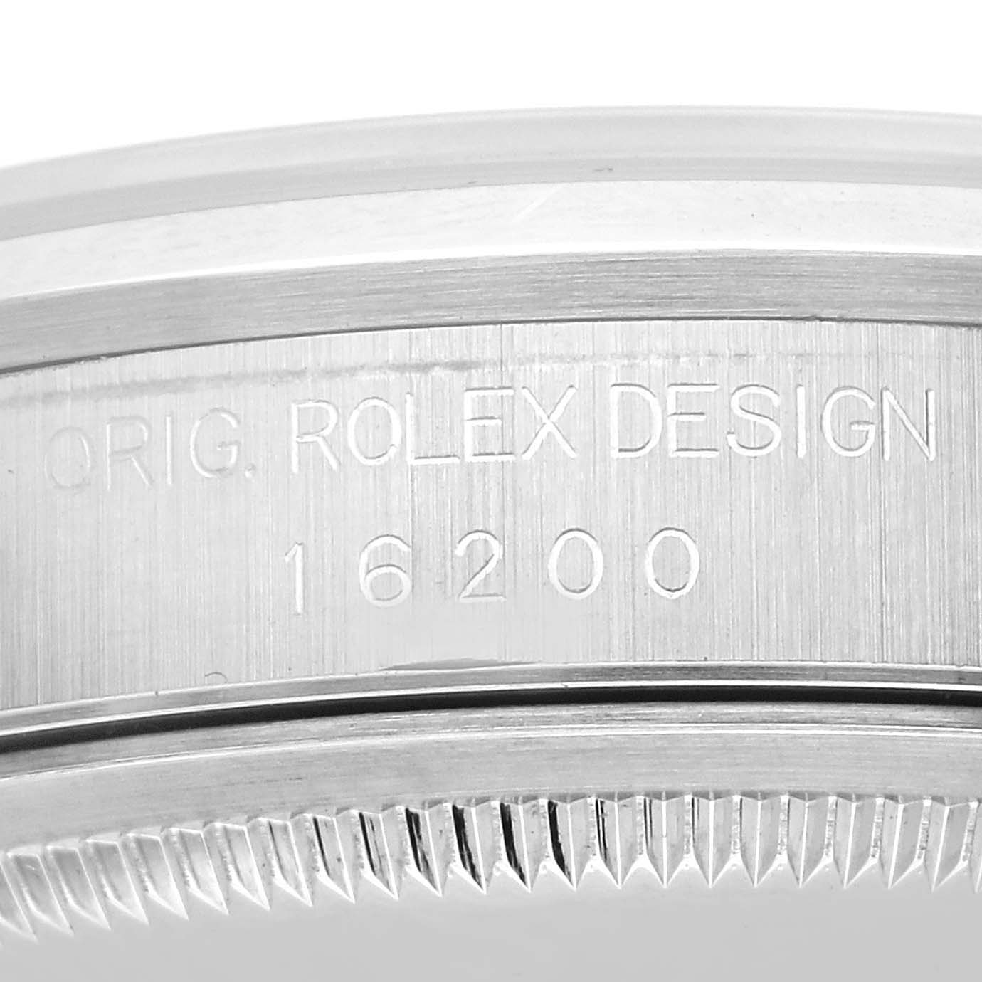 This close-up image shows the case side of a Rolex Datejust 16200 Men's Stainless Steel Silver Dial 16200 Men's Stainless Steel Silver Dial 16200 model with engraving details.