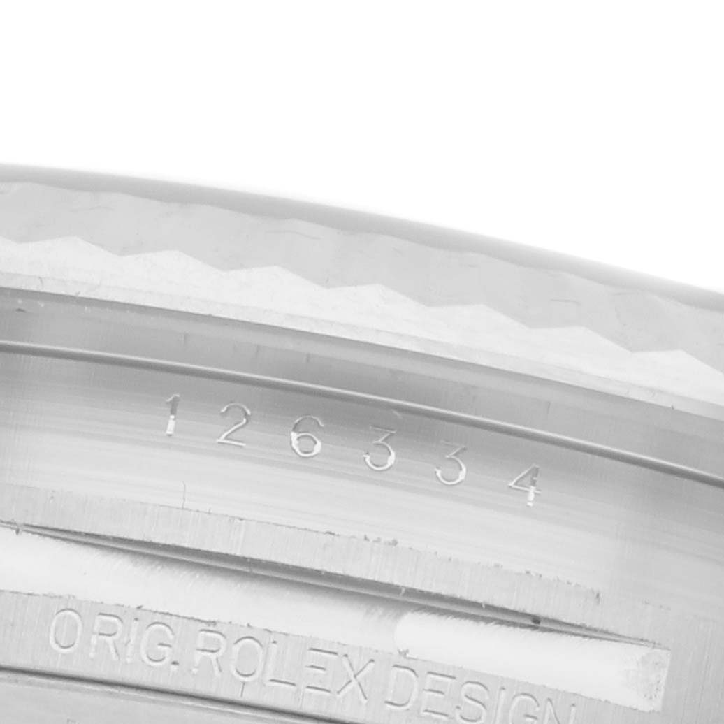 The image shows a close-up of the case side of a Rolex Datejust 41 126334 Men
s Stainless Steel Grey Dial 126334 Men
s Stainless Steel Grey Dial, highlighting the engraved model number and "Orig. Rolex Design."
