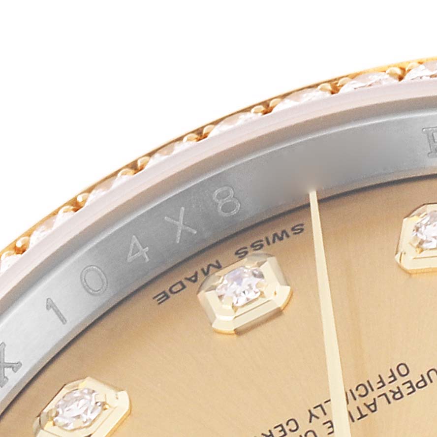 The image shows a close-up of the Rolex Datejust 116243 Men's Steel and Gold (two tone) Champagne Dial 116243 Men's Steel and Gold (two tone) Champagne Dial watch, highlighting the dial, diamond markers, and part of the bezel.