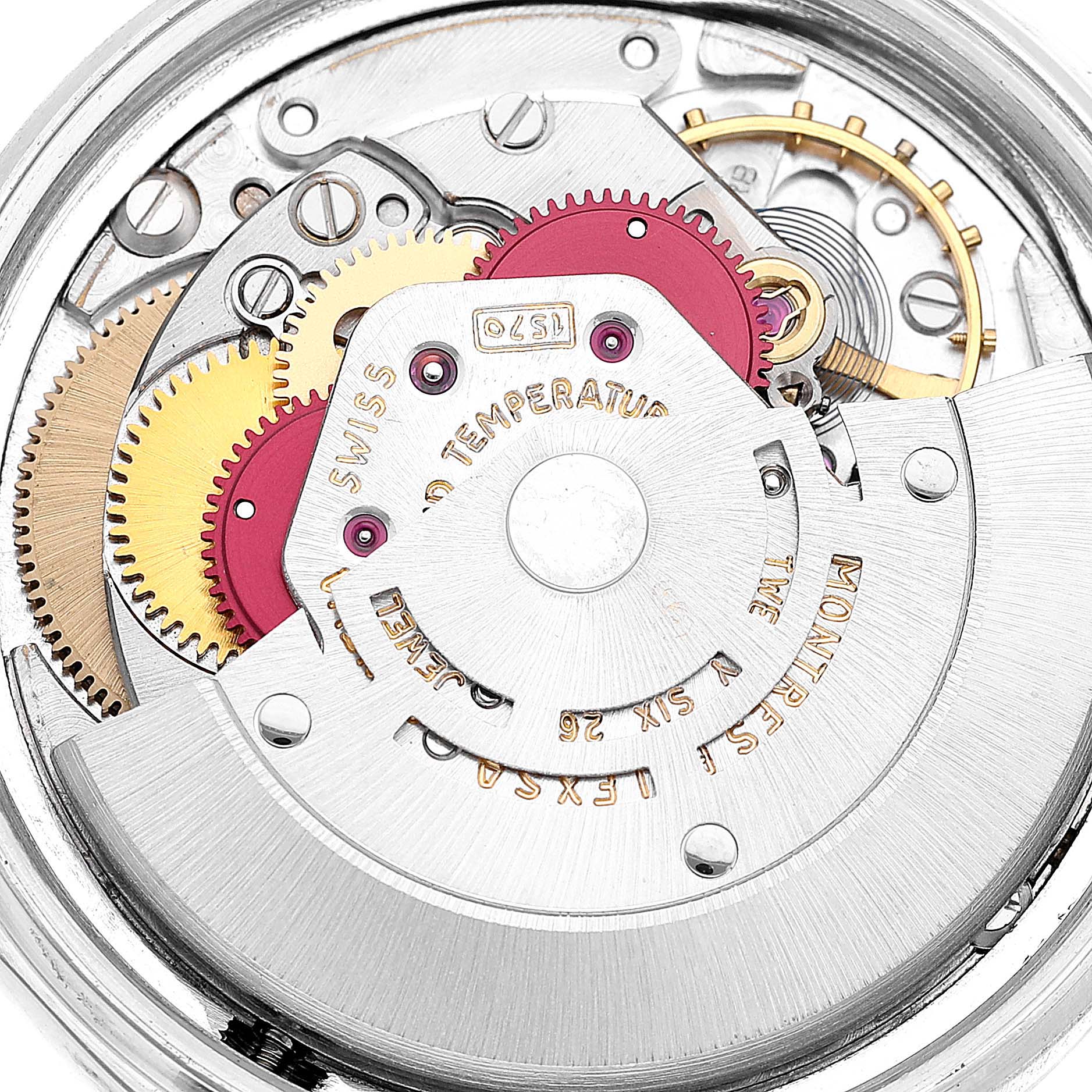 This image shows the intricate internal mechanical components of the Vintage Collection Rolex watch at an overhead angle.