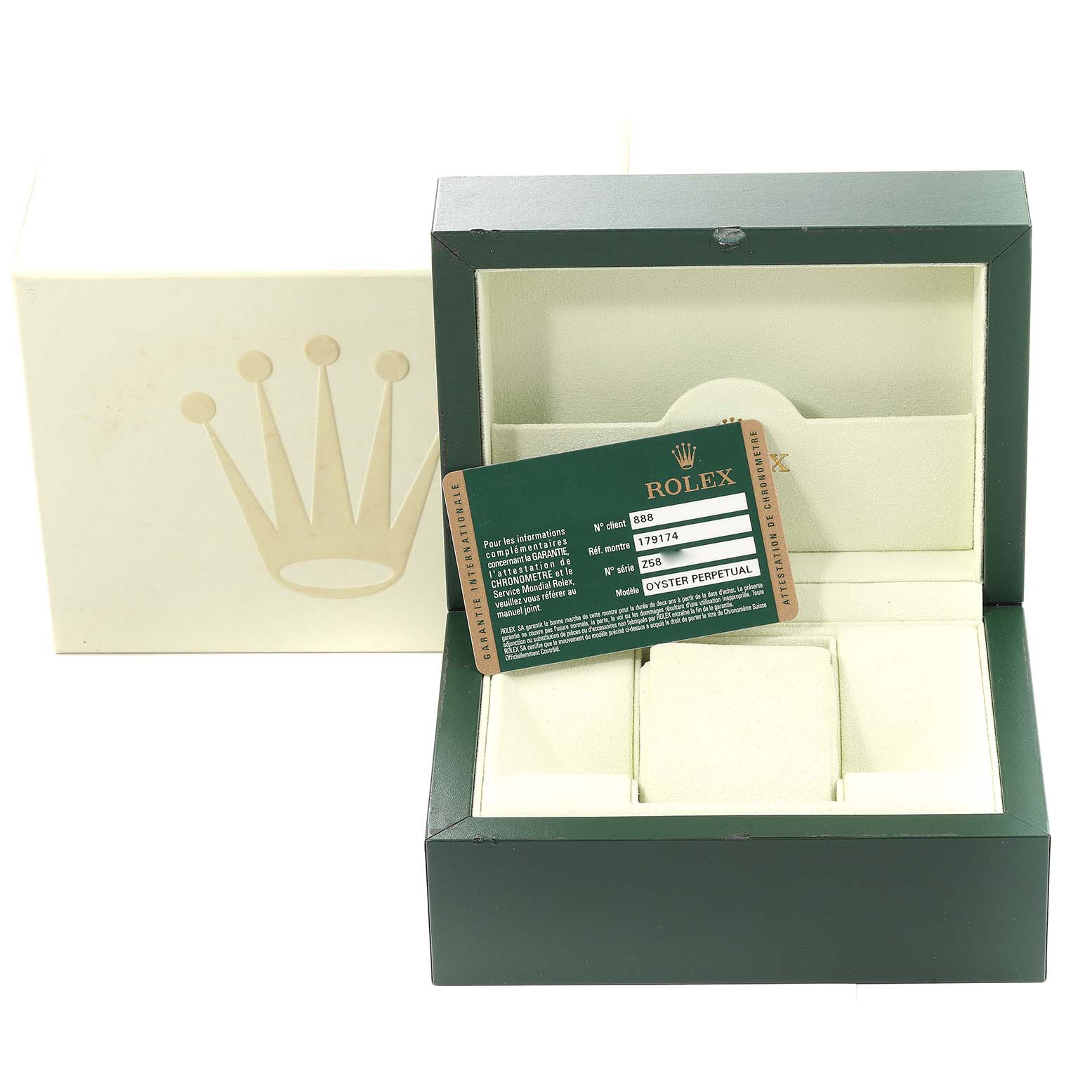 The image shows an open green Rolex Datejust 179174 Women's Stainless Steel Pink Dial 179174 Women's Stainless Steel Pink Dial box and an authenticity card, displaying the interior compartments.