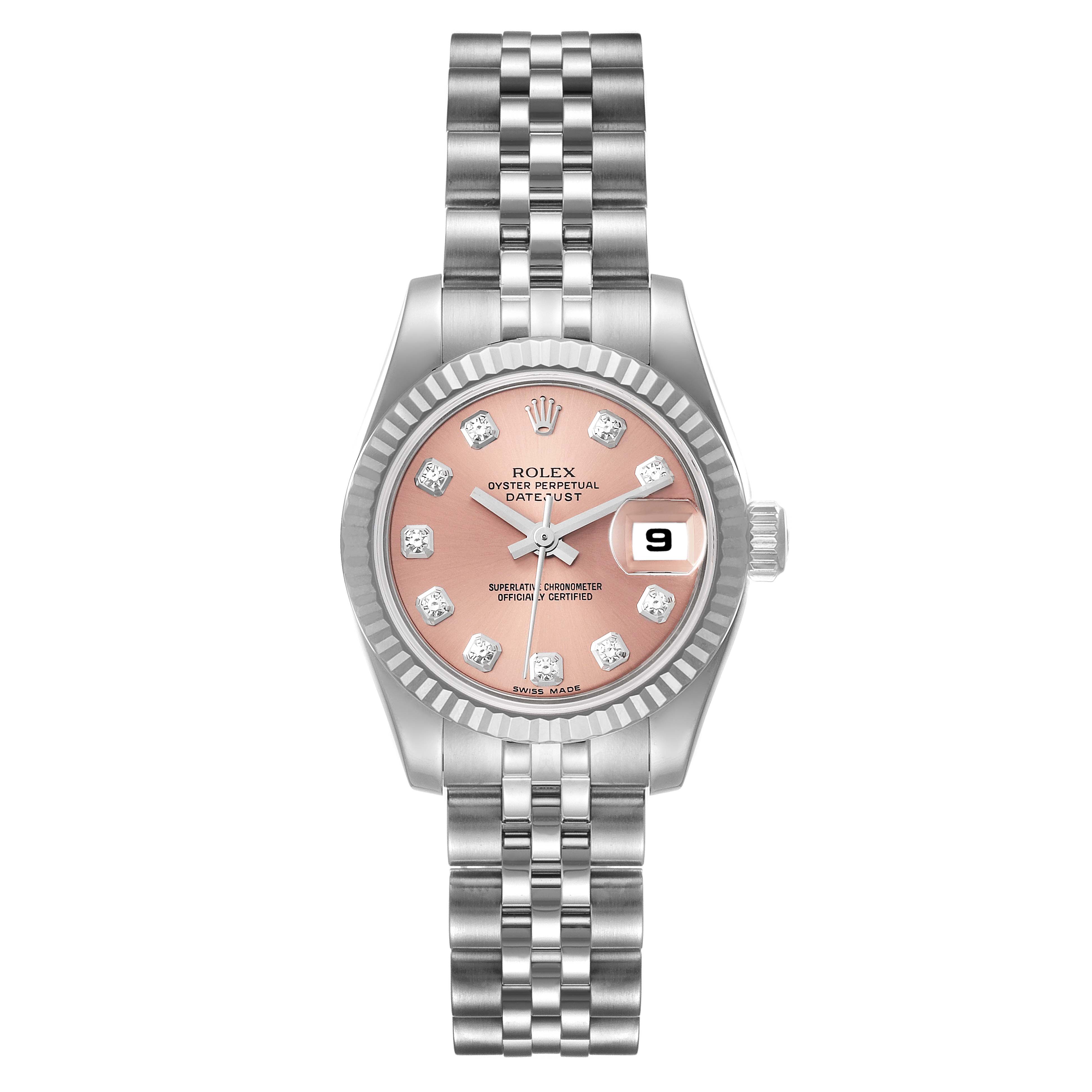 This is a head-on view of a Rolex Datejust 179174 Women's Stainless Steel Pink Dial 179174 Women's Stainless Steel Pink Dial, showing its pink dial, jubilee bracelet, date window, and fluted bezel.