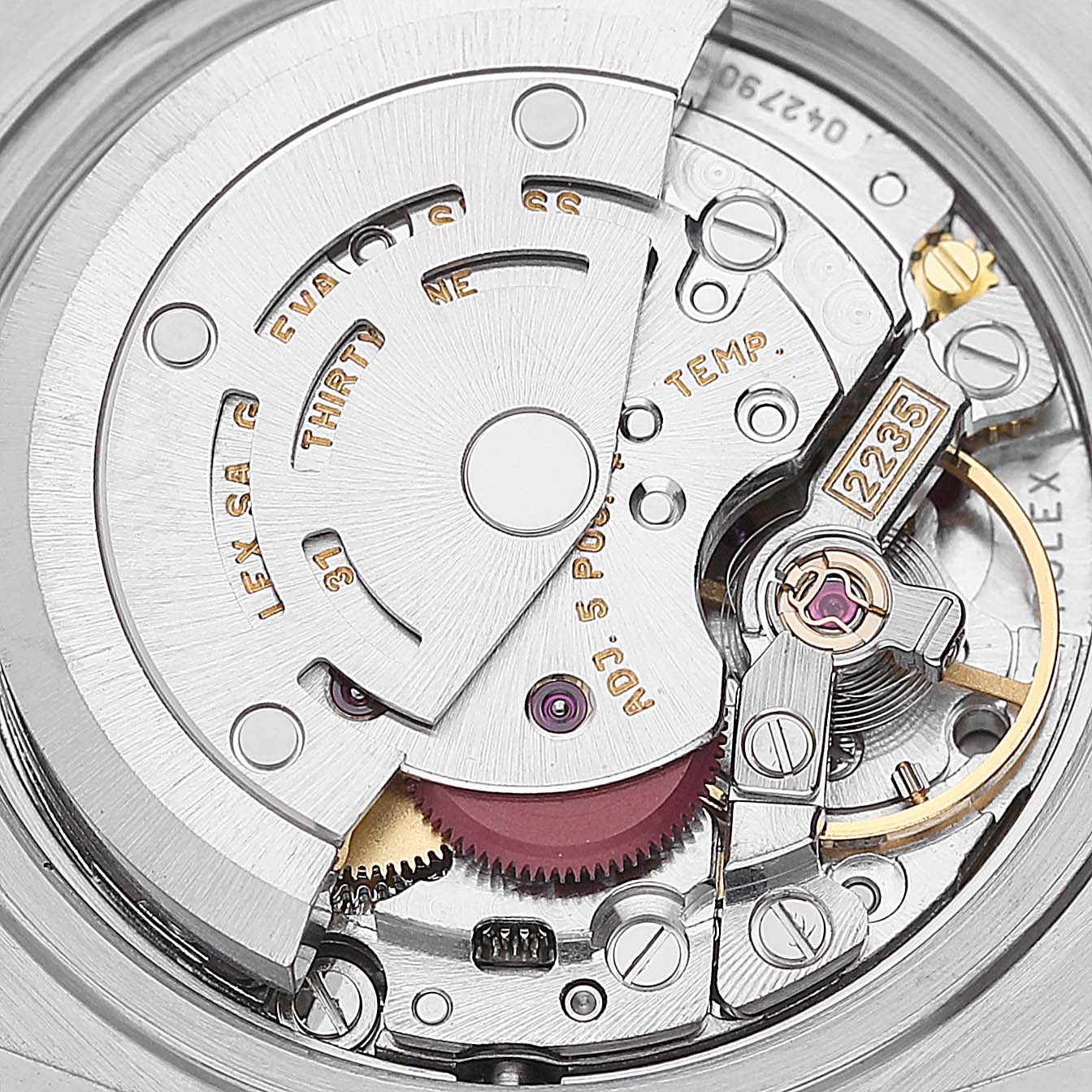The image shows the intricate internal mechanics of a Rolex Datejust 79163 Women's Steel and Gold (two tone) Silver Dial 79163 Women's Steel and Gold (two tone) Silver Dial watch from a top-down angle.