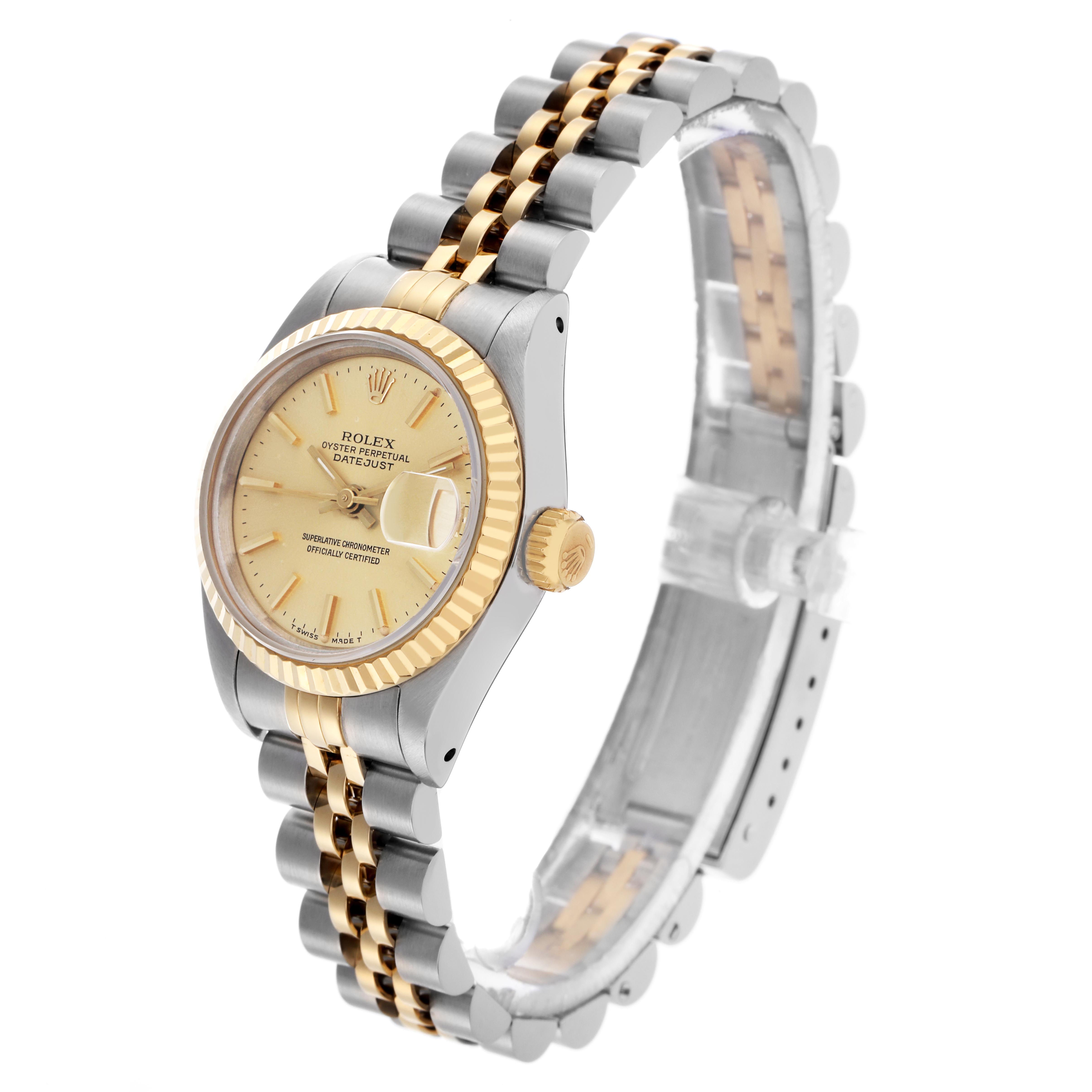 The Rolex Datejust 69173 Women's Steel and Gold (two tone) Champagne Dial 69173 Women's Steel and Gold (two tone) Champagne Dial is shown from a side angle, highlighting the gold bezel, dial, crown, and two-tone bracelet.