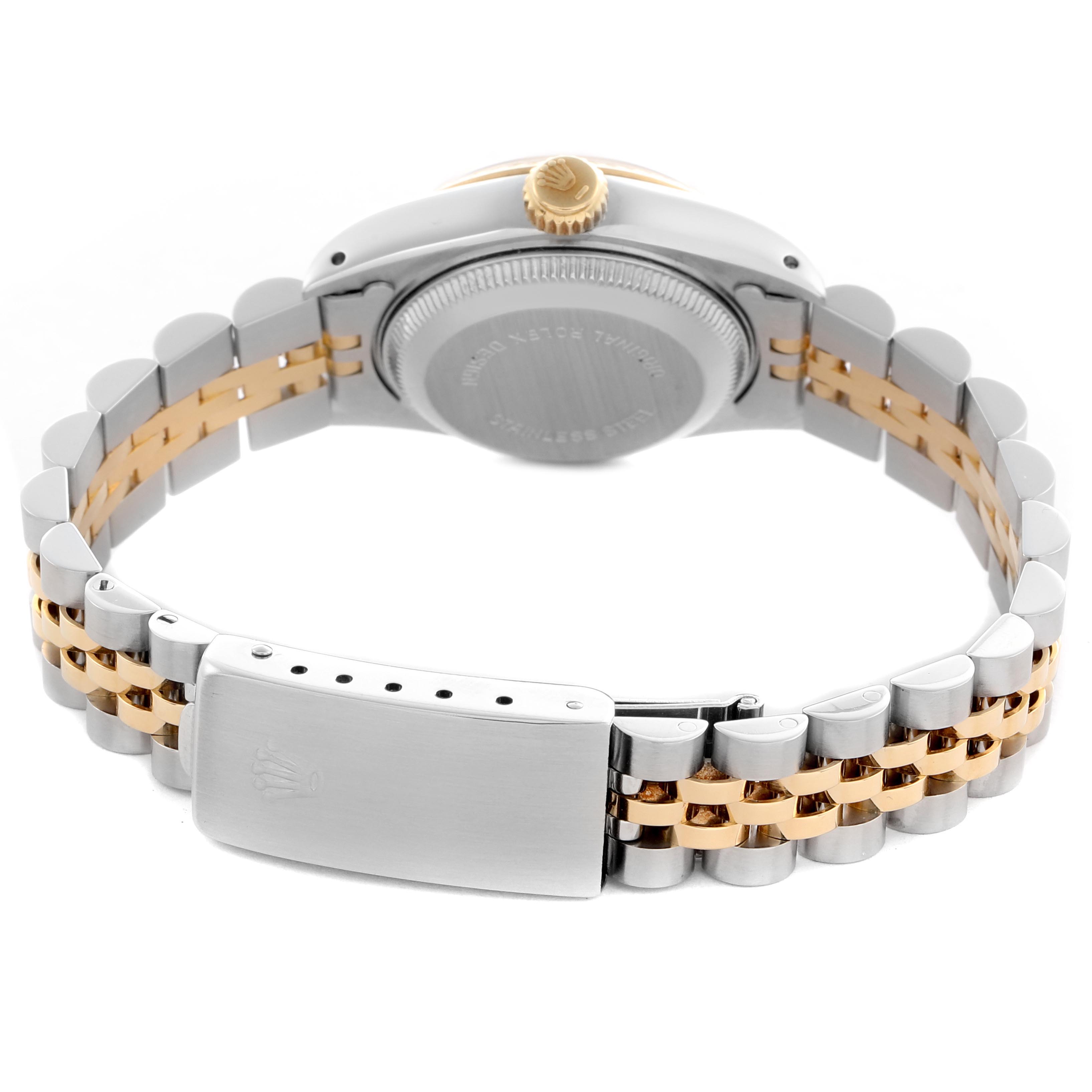 The image shows a Rolex Datejust 69173 Women's Steel and Gold (two tone) Champagne Dial 69173 Women's Steel and Gold (two tone) Champagne Dial watch from the rear, highlighting the closed clasp, two-tone bracelet, and case back.