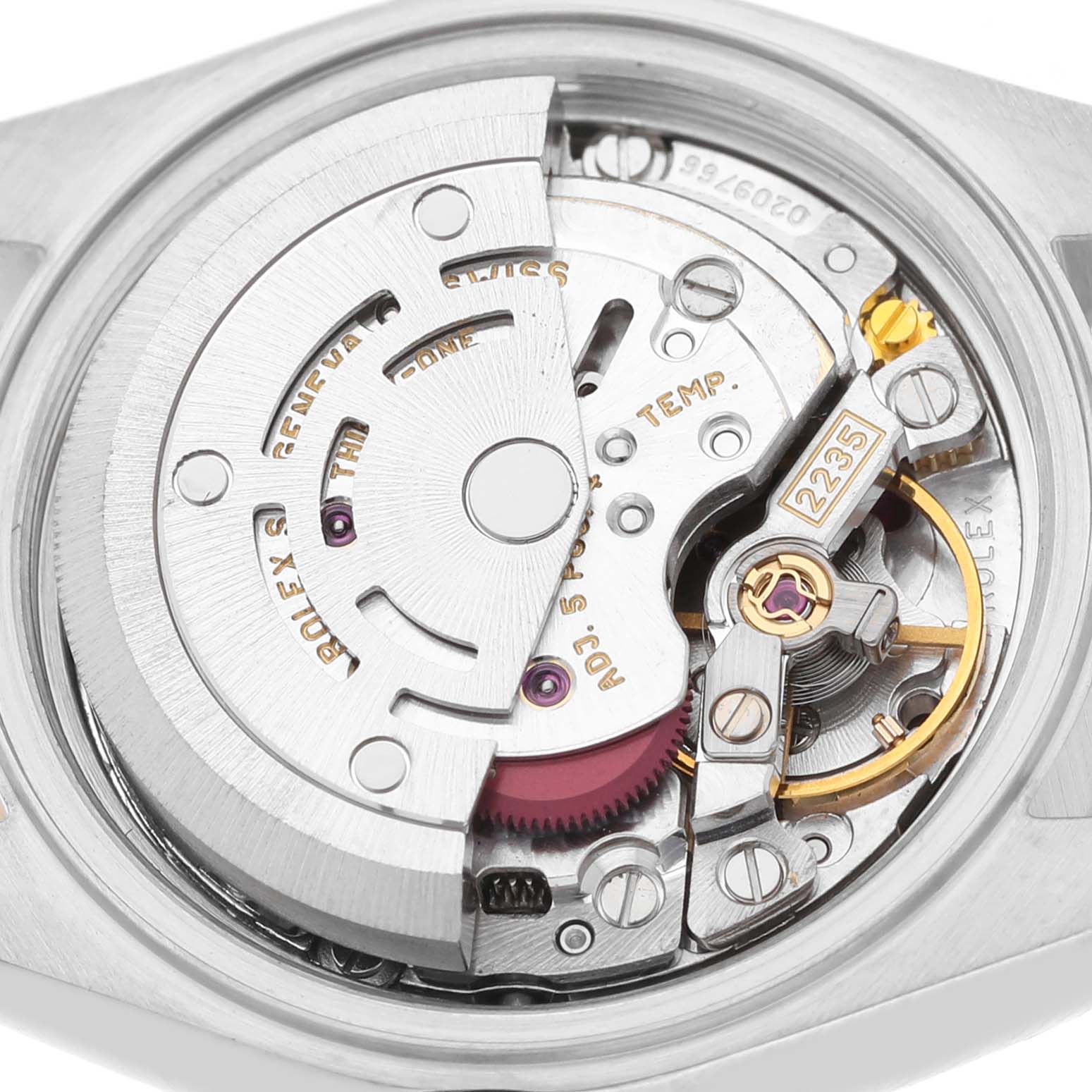 The image shows the movement of a Rolex Datejust 79173 Women's Steel and Gold (two tone) Champagne Dial watch from a back view, highlighting the rotor and intricate internal components.