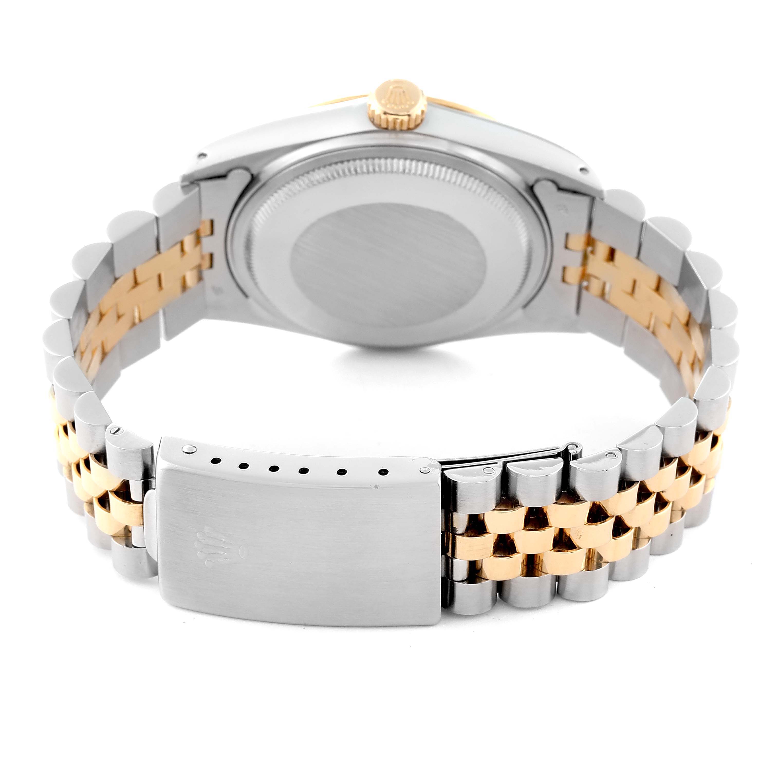 The image shows the back view of a Rolex Vintage Collection 16013 Men's Steel and Gold (two tone) Champagne Dial 16013 Men's Steel and Gold (two tone) Champagne Dial watch, highlighting its case, crown, and two-tone bracelet.