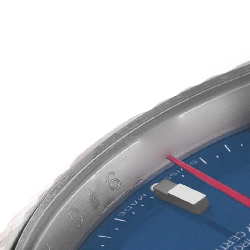 The image shows a close-up, angled view of the Rolex Turn-o-Graph 116264 Men's Stainless Steel Blue Dial bezel and partial dial with a red second hand.