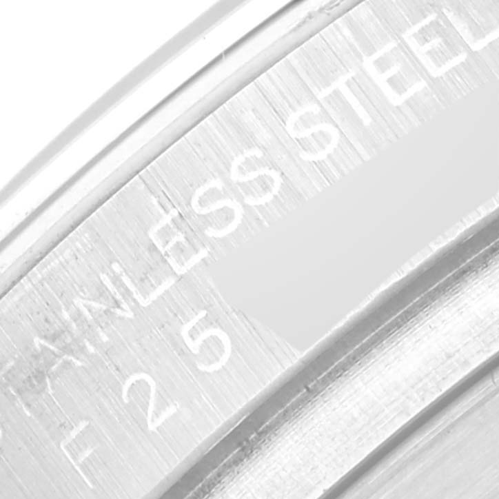 This image shows a close-up of the Rolex Daytona 116520 Men's Stainless Steel White Dial 116520 Men's Stainless Steel White Dial watch's stainless steel back casing, highlighting the engraved text details.