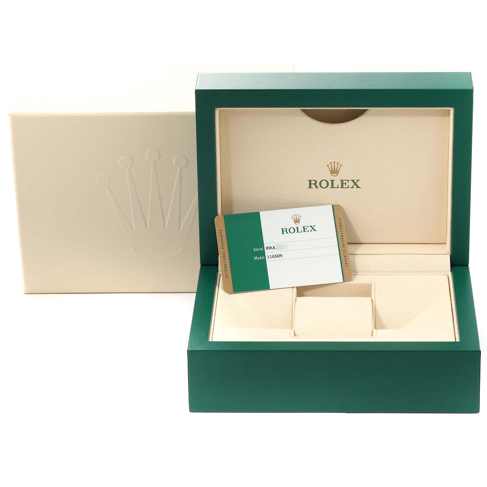 A Rolex Daytona 116509 Men's White Gold Blue Dial 116509 Men's White Gold Blue Dial watch box and warranty card are shown from a front angle, with no watch inside the box.