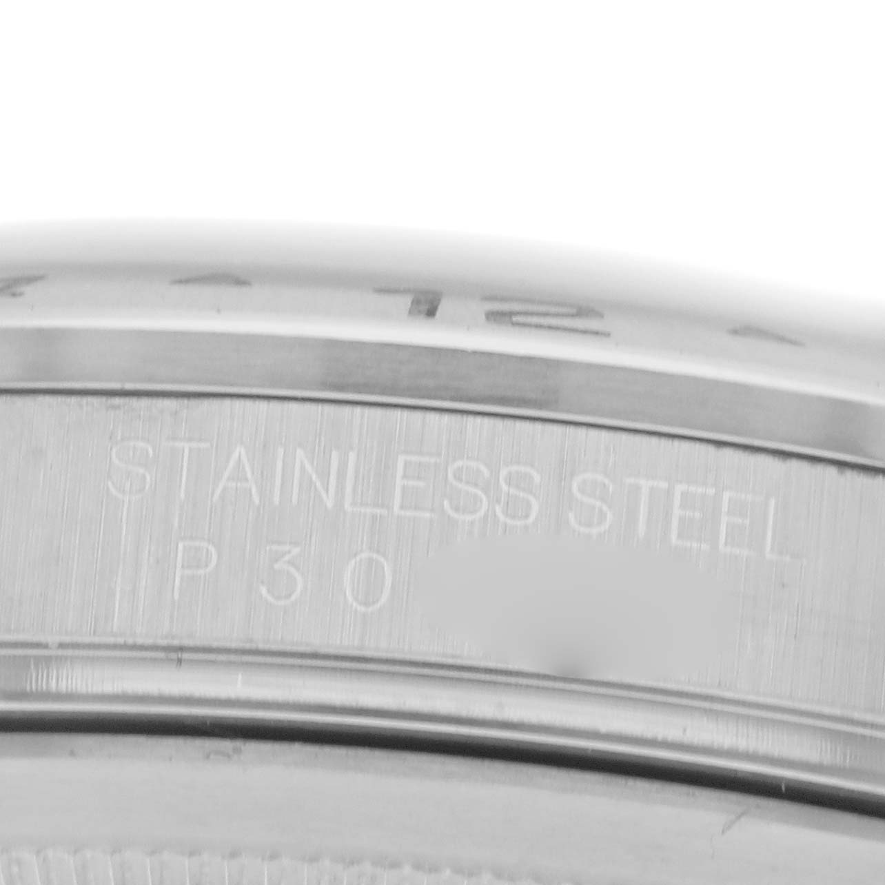 The image shows a close-up of the side of a stainless steel case edge on a Rolex Explorer 16570 Men's Stainless Steel White Dial 16570 Men's Stainless Steel White Dial watch.