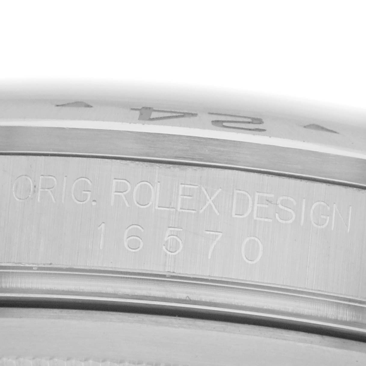 The image shows a close-up of the side of the Rolex Explorer 16570 Men's Stainless Steel White Dial 16570 Men's Stainless Steel White Dial watch case, highlighting the engraved model design number "16570."