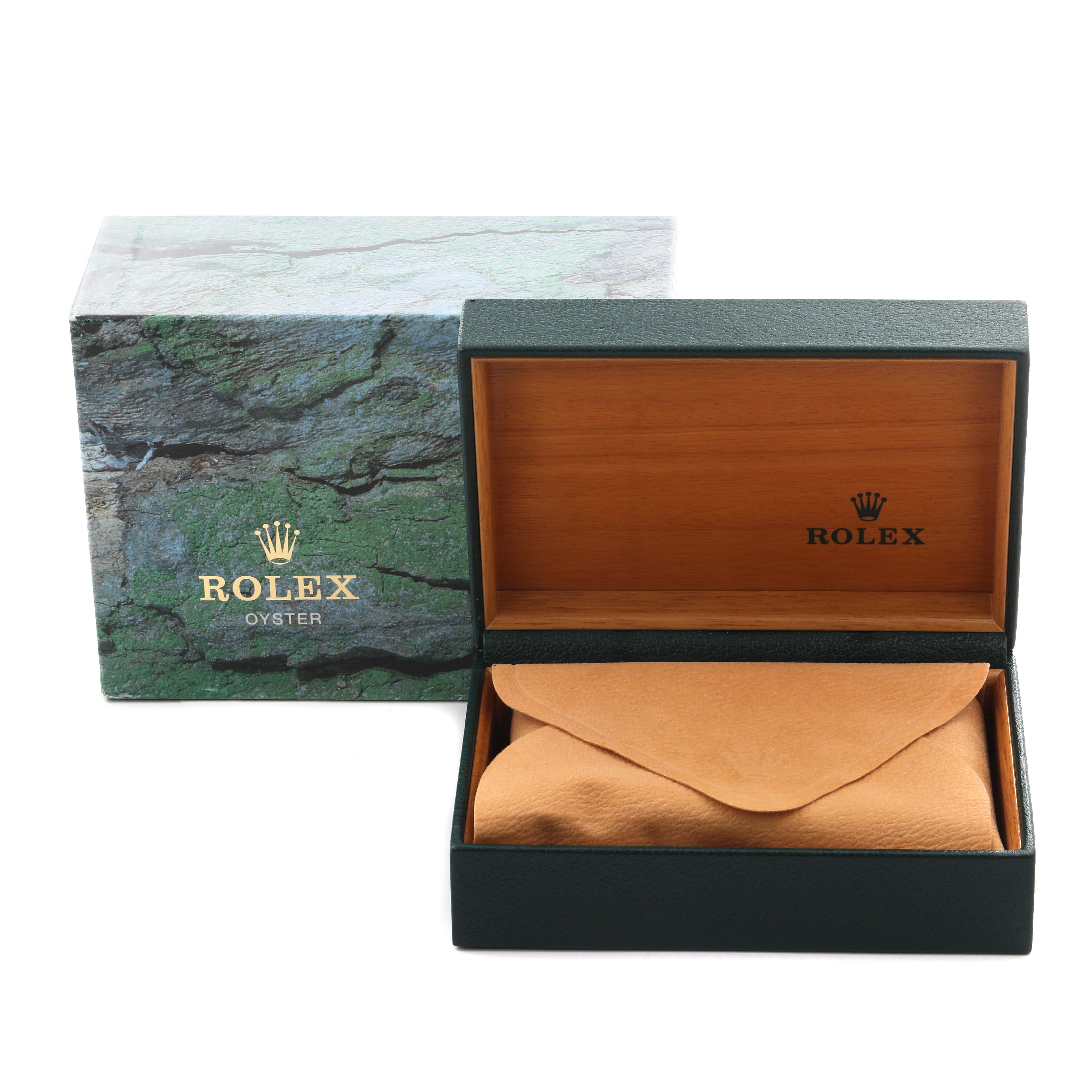 The image shows an open Rolex Explorer 16570 Men's Stainless Steel White Dial 16570 Men's Stainless Steel White Dial watch box and a green outer box with the Rolex logo.