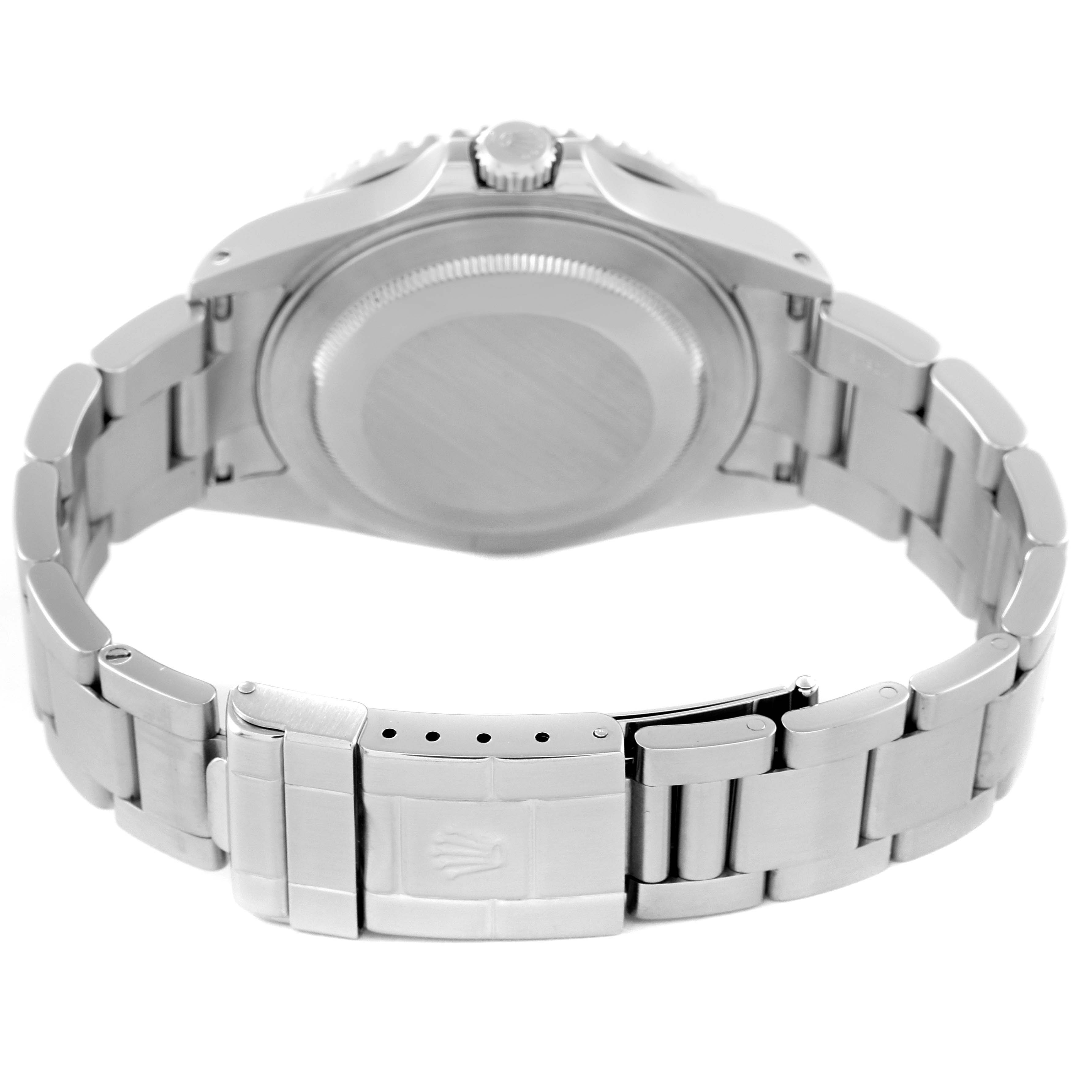 The image shows a rear view of the caseback and stainless steel bracelet of a Rolex GMT-Master 16710 Men's Stainless Steel Black Dial 16710 Men's Stainless Steel Black Dial watch.