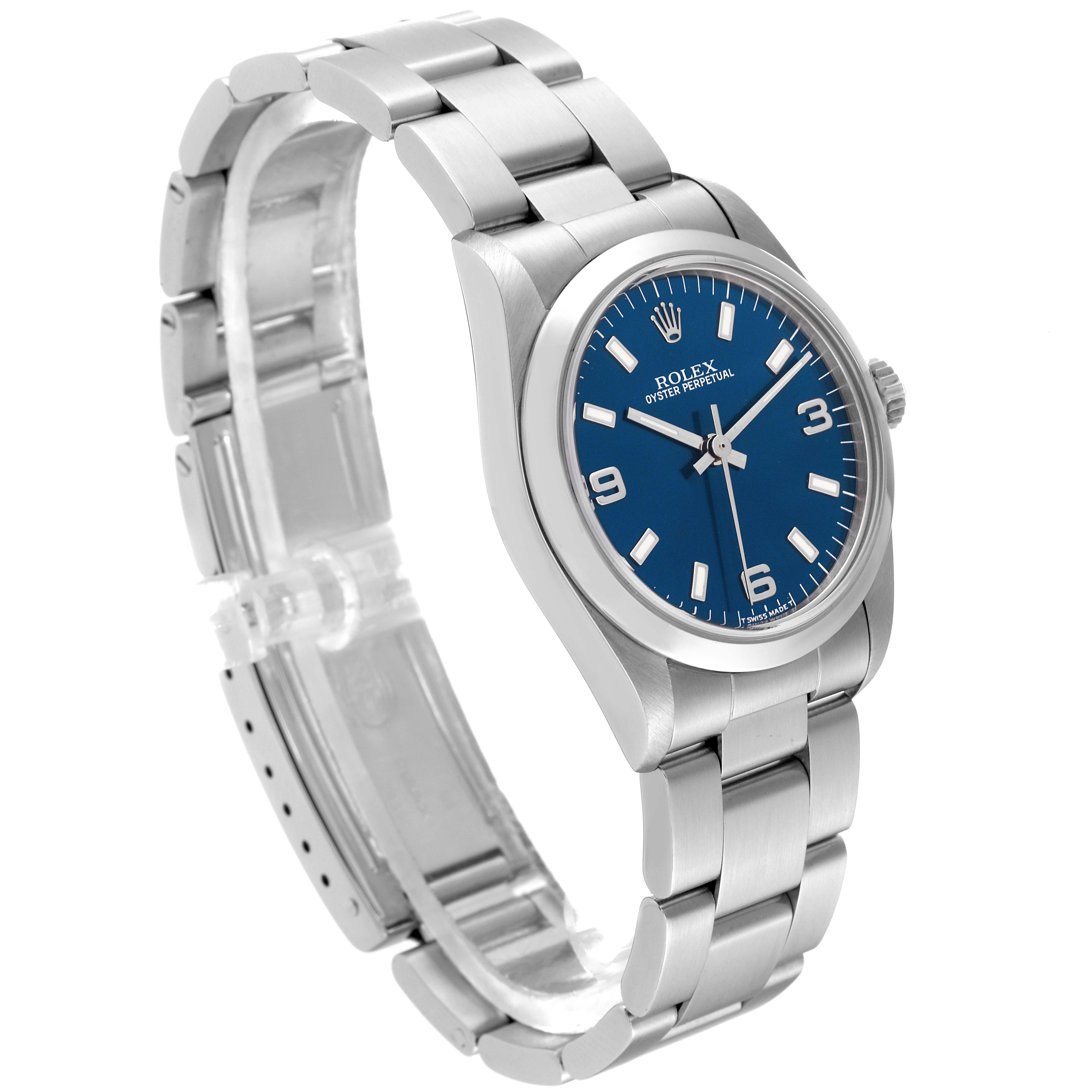 The image shows a side view of a Rolex Oyster Perpetual Mid-Size watch, highlighting its stainless steel bracelet and blue dial.