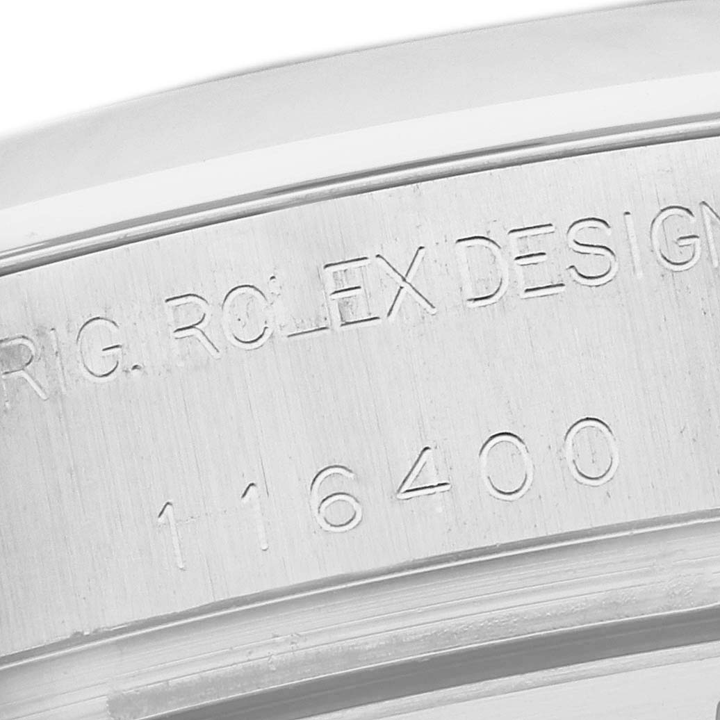 This image shows a close-up of the engraved case of a Rolex Milgauss 116400 Men's Stainless Steel Black Dial 116400 Men's Stainless Steel Black Dial watch, highlighting model number 116400.