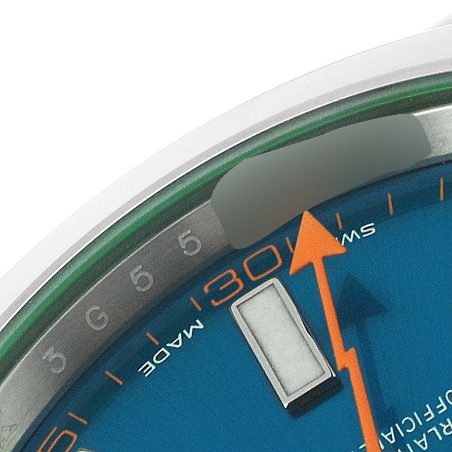 This image shows a close-up of the dial, hour markers, and the seconds hand of the Rolex Milgauss 116400GV Men
s Stainless Steel Blue Dial 116400GV Men
s Stainless Steel Blue Dial watch.