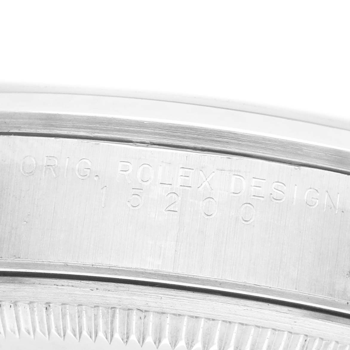The image shows a close-up of the case side of the Rolex Date 15200 Men's Stainless Steel Silver Dial watch, specifically highlighting the engraved model number.
